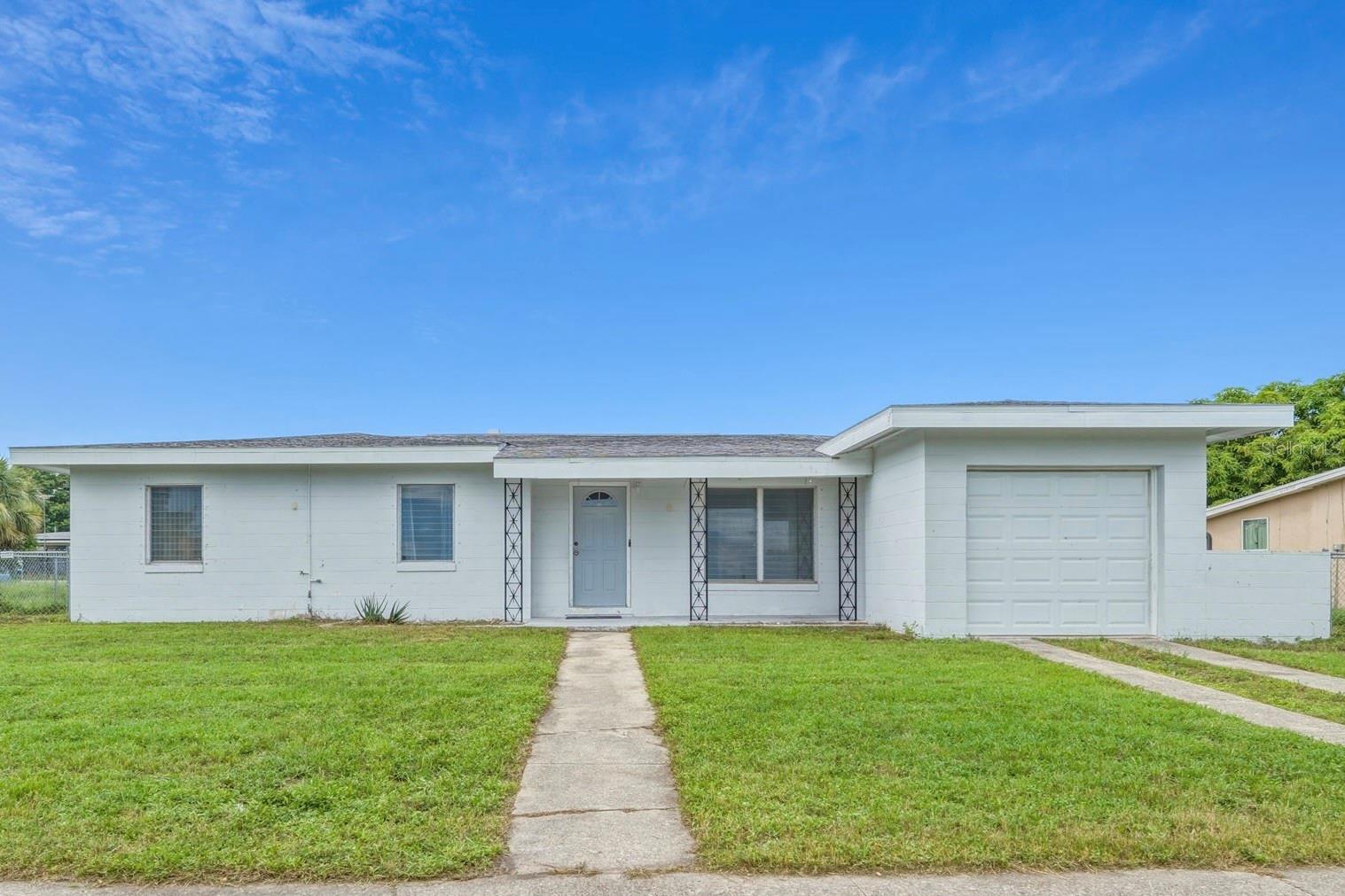 Virtually Staged. No HOA. No flood zone. Public water & sewer. Some of the most important decisions have already been made. Roof was replaced in 2022, fresh interior paint, tile flooring throughout, and hurricane shutters create a move-in-ready foundation, while the concrete block construction offers lasting durability.

With 3 bedrooms, 1 bathroom, an attached one-car garage, and both a living room and separate family room, the layout provides the flexibility to adapt to the way you live. Outside, the fully fenced backyard offers room for pets, entertaining, gardening, or simply enjoying your own private outdoor space.

Conveniently located just minutes from Charlotte Harbor, public boat ramps, Port Charlotte Beach Park, shopping, dining, medical facilities, and with easy access to US-41 and I-75, this home combines everyday convenience with the features buyers continue to value most.