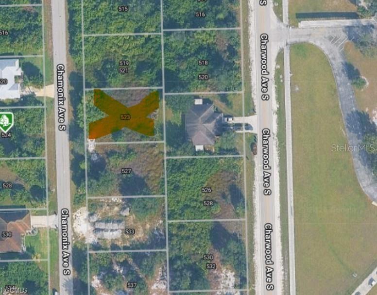 Build your dream home with built-in flexibility on this spacious lot at 523/525 Chamonix Ave S, located in a rapidly growing area of Lehigh Acres. This property offers a unique development opportunity, as you can a principal residence combined with an Accessory Dwelling Unit (ADU), effectively functioning as a duplex-style home. This is great investors looking to maximize ROI, offering a high-utility layout that supports long-term rental income from two distinct units or a high-demand house hacking opportunity in a growing market. Conveniently situated near SR-82, you’ll enjoy easy access to Fort Myers, local schools, shopping, and dining, making this an ideal location to build now or invest for the future in Southwest Florida.