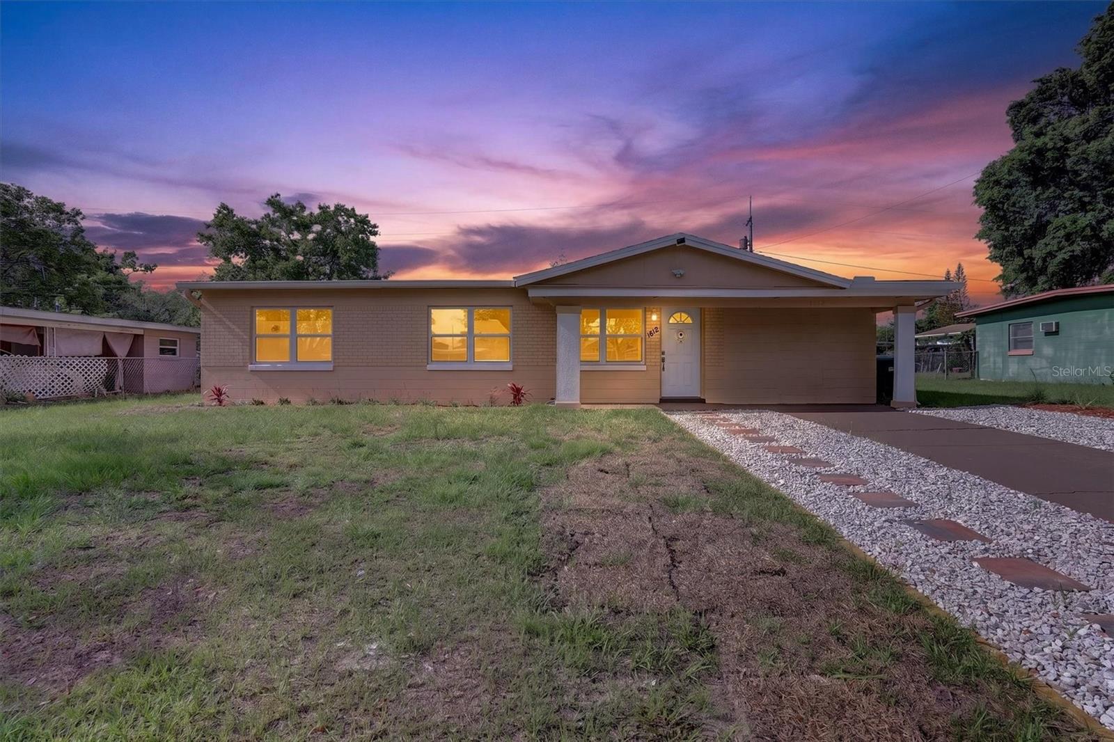 Fully refurbished to NEW! Cute 4-bedroom, 2-bathroom concrete block single-story residence. .located on a large lot in a quiet, established Orlando neighborhood. Thoughtfully updated, with a new kitchen appliances package. included, a dedicated washer and dryer, and a newly installed A/C system for modern comfort, convenience, and efficiency. Open floor plan and cathedral ceiling enhance the family space, while the granite kitchen and breakfast bar add a luxurious touch. Lots of windows create good and balanced lighting. The home offers a laundry room. The property offers flexible use as a primary residence or an income-producing rental. It is conveniently situated with easy access to downtown Orlando, Camping World Stadium, and Lake Lorna Doone Park. Located in one of Orlando's hottest shopping districts. Commuters will appreciate quick connectivity to major highways including I-4 and SR 408, as well as proximity to Orlando International Airport and major medical facilities. Enjoy Florida living with a short drive (from Orlando) to the Atlantic coast, including Daytona Beach, Cocoa Beach, and Cape Canaveral. World-renowned attractions such as Walt Disney World and Universal Studios Florida are also just a short drive away. No HOA—offering added flexibility (fewer restrictions). Located in a high-demand area with strong growth potential, this property presents an excellent opportunity to build equity or expand an investment portfolio. Schedule your private showing today! Opportunities like this in Orlando don’t last. Awesome Price! If travelling out of town, welcome to Orlando, the "City Beautiful! The magic begins here!