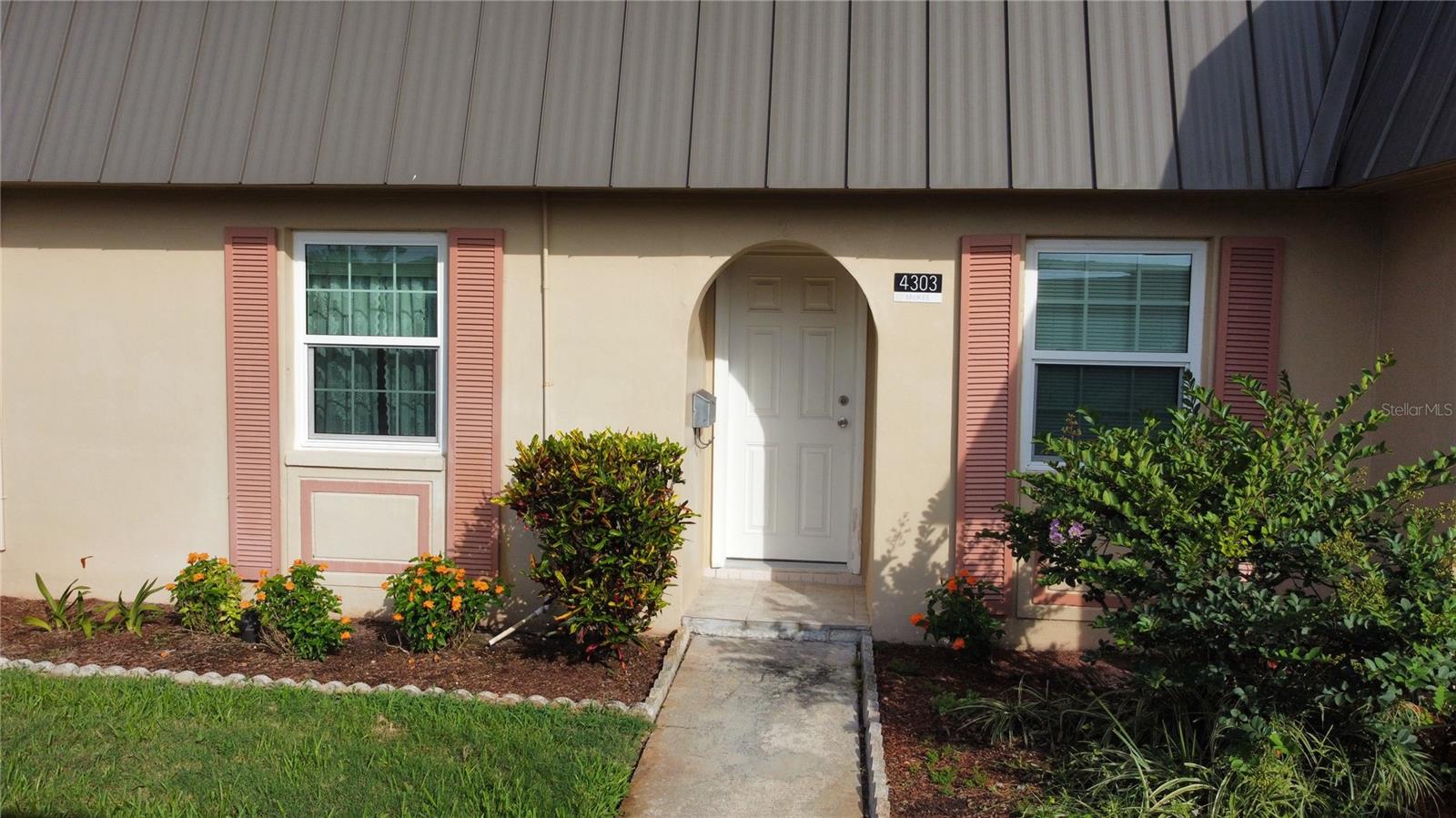 Experience carefree living in this charming two-bedroom, one-bath condo in the gated, 55+ Gardens of Beacon Square community in New Port Richey, FL. Unit did not flood during storm 10/2024. Recently renovated with modern upgrades, this home features in-unit laundry and designated covered parking, new kitchen cabinets and formica counter tops offering both convenience and comfort. New AC, electrical panel, and impact windows throughout. Located minutes from scenic county parks, beaches, and recreational centers along the protected West Pasco coastline, with a new paved trail for walking and biking. Enjoy easy access to restaurants, shopping, a drugstore, and the quaint downtown area, brimming with old Florida charm, including a library, farmers market, and more. This condo’s spacious layout sets it apart from nearby units. Dont miss your chance to live the vibrant coastal lifestyle you've dreamed of, schedule your showing today before this gem is gone!