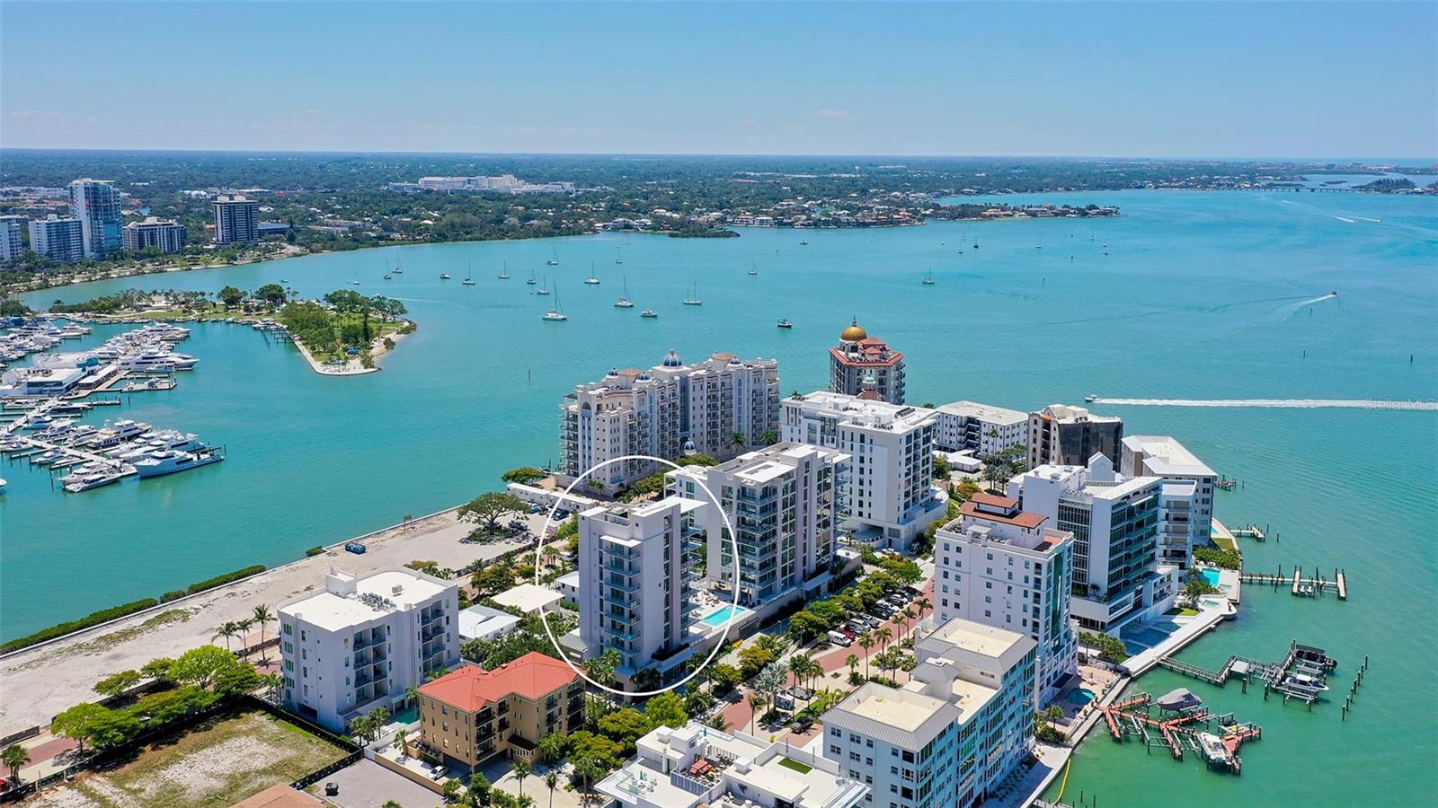 Beautiful residence in Golden Gate Point featuring 3 bedrooms, 3 full bathrooms, and a powder room, with a spacious great room and breathtaking views of Sarasota Bay. This exceptional residence showcases European cabinetry, gas cooktops, quartz countertops, Wolf and Sub-Zero appliances, hardwood flooring, floor-to-ceiling windows with electric shades, custom-designed closets scheduled for installation in June, outdoor grill on your private terrace. The residence also includes two dedicated parking spaces in the garage with a storage unit.
Residents enjoy an impressive collection of amenities, including a resort-style swimming pool, fitness center, private wine storage, and an incomparable rooftop gathering space — perfect for entertaining friends and family or simply admiring the stunning Sarasota sunsets.
Nestled on a beautiful peninsula, this exclusive property offers the perfect balance of privacy and convenience, just steps from the vibrant heart of downtown Sarasota.This residence includes the convenience of a smart home system. Featuring an upgraded  private den with glass doors for your convenience of a home office, wine room or anything that suits your lifestyle. Come experience it in person and claim your own piece of paradise.