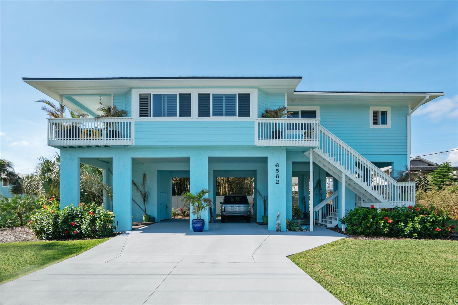 Ocean views from the rooftop deck. Partial ocean views from the family room, master bedroom and patio. Complete renovation in 2018 & 2019, list of improvements attached. New roof in December 2017. Open floor plan. Ground level deck is perfect for games and grilling. Ground level storage for bikes, boards and beach gear. Moments away from the river and Manatee Park. Just up the road from Canaveral National Seashore. ;Water: City