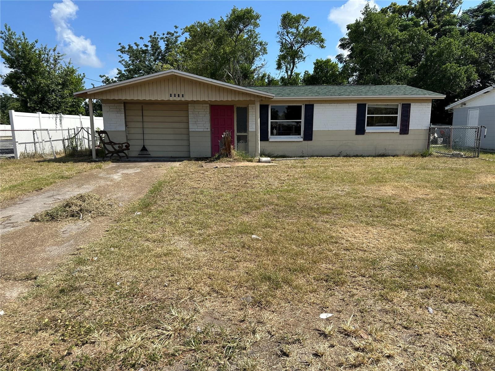 Set right along FL-54 in New Port Richey, 4923 FL-54 puts you in the middle of one of Pasco County's most convenient corridors. This Mixed
property (Commercial and/or Residential) is all about location and possibility, offering the perfect blank canvas for buyers, investors, or dreamers ready to roll up their sleeves. The setting couldn't be easier. Local grocery sits just over a mile away, keeping everyday errands quick and simple. School is close by for families, and nearby parks with green spaces add a welcome touch of calm to the neighborhood. With major roads only steps from your door, commuting, shopping, and weekend outings are effortless. Downtown New Port Richey, Gulf beaches, and dining spots are all within comfortable reach, giving you the best of relaxed Florida living. What truly sets this property apart is its renovation potential. This 2-bedroom, 1-bathroom, nice sized fenced backyard home is ready for a fresh vision, the opportunity here is wide open. The high-visibility FL-54 frontage also opens the door to creative possibilities, making this a rare find in a growing area. Roof is less than 6 months old! Properties like this—priced with room to build sweat equity in such a connected location—don't come along often. Bring your ideas, your tools, and your imagination, and turn this diamond in the rough into something special. Schedule your private showing today before this opportunity slips away!