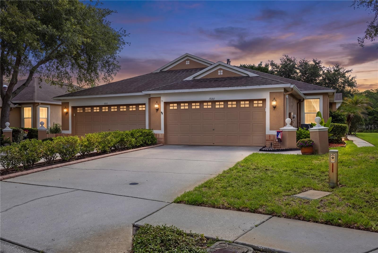 Maintenance-free living with a breathtaking view! Welcome to 19109 White Wing Place, located in the small gated community of Doves Landing in West Meadows. Perfectly positioned on a premium waterfront homesite, this villa offers sprawling pond views with peaceful conservation beyond the lake. The entire back of the home is framed by this beautiful natural setting, creating an incredible sense of privacy, tranquility, and true Florida living.

This spacious villa offers 3 bedrooms, 2 bathrooms, a 2-car garage, and a large screened lanai designed to take full advantage of the stunning water and conservation views. From the moment you step inside, the open and comfortable floor plan offers easy everyday living with plenty of natural light and a beautiful connection to the outdoors.

The kitchen features white cabinetry, stainless steel appliances, ample counter space, a breakfast bar, closet pantry, ceramic tile flooring, and a sunny breakfast nook. The great room opens through sliding glass doors to the oversized screened patio, where the pond and conservation backdrop create the perfect place to relax, entertain, or simply enjoy the view. This is not a peek-a-boo water view. This is a full, breathtaking lake and conservation backdrop, and it is absolutely gorgeous.

The owner’s retreat is privately positioned and features a tray ceiling, window treatments, and a spacious en suite bath with dual vanities, a walk-in closet, and a generous walk-in shower. The secondary bedrooms are located on the opposite side of the home, offering privacy for guests, family, or a home office setup.

Additional improvements include a new water heater in 2025, vinyl flooring in 2022, updated kitchen and bathroom sinks in 2022, master bath window treatments in 2022, interior paint in 2020, resurfaced patio in 2019, HVAC in 2016, kitchen range and dishwasher in 2016, garage door opener in 2016, and roof in 2014.

Doves Landing offers the ease of maintenance-free living with exterior painting, roof, lawn service, community pool, and gated entrance included. Residents also enjoy access to the fabulous West Meadows amenities, including a community center, resort-style pool with a two-story water slide, lap pool, fitness center, tennis courts, basketball courts, playground, and meeting room. Conveniently located near I-75, shopping, dining, hospitals, USF, Wiregrass, Tampa Premium Outlets, and all that New Tampa and Wesley Chapel have to offer.