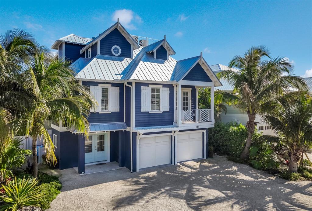 CASH FLOW - GROSSING $250K in 2022 and NETTED after ALL expenses over $130K!!! Over $200K so far on the books for 2023!!! Absolutely stunning CUSTOM home! - Welcome to Casa Amiga! This home was tastefully built in 2018. The three story home is comprised of 4 bedrooms, 4.5 baths and located in the beautiful and highly desired City of Anna Maria! Casa Amiga is in a PRIME LOCATION; just a short walk to the Bay, Gulf Beaches, popular Bean Point, and the always fun Pine Avenue. Arriving at your future home you will be drawn in by the Key West architectural structure providing that charming island appeal. The entryway reveals a warm and welcoming foyer that sets the tone for the luxury features and design excellence boasting throughout the home. Take the elevator/stairs to the main level and you will find a  spacious open living space featuring vaulted shiplap ceilings, craftsman wood work finishes, luxury flooring, and plenty of windows for natural light. The centrally located Dream kitchen has been beautifully designed with custom cabinets, QUARTZ countertops, large center Island with inviting breakfast bar, stainless steel appliances, and herringbone tile backsplash. The Large open concept kitchen, dining, and living room combo will make entertaining a breeze! The main floor offers three ensuite bedrooms with plenty of privacy for all and a half bath for guests.  Escape to complete serenity on your third floor Primary's suite offering oversized walk-in closet, large bathroom including custom ceramic tile flooring, spacious walk-in shower with gorgeous custom tile finishes and rainfall shower. The Primary's retreat has a private loft style reading room equipped with a beverage station for your morning coffee or a glass of wine to enjoy the beautiful sunset on the rooftop deck. The rooftop deck offers a 360-degree view of the north end of the island including Lake LaVista and the Tampa Bay! Enjoy those sunny Florida days on any of your three balconies offering views from all points of the home. Multiple sliding glass doors lead you to your outdoor living oasis, which is truly what Florida living is all about! Your private fully fenced spacious backyard boasting in-ground POOL with overflow SPA, outdoor shower, plenty of covered patio space, and outdoor bar area ideal for entertaining!  Not to mention...Casa Amiga is a very successful weekly rental with a special occupancy for 10.  This beautiful home is full of everything you need and more to live in and/or rent out. This home comes fully furnished and is ready for its new owner. Check out the matterport 3D video walkthrough at https://listing.thehoverbureau.com/ut/144_Crescent.html