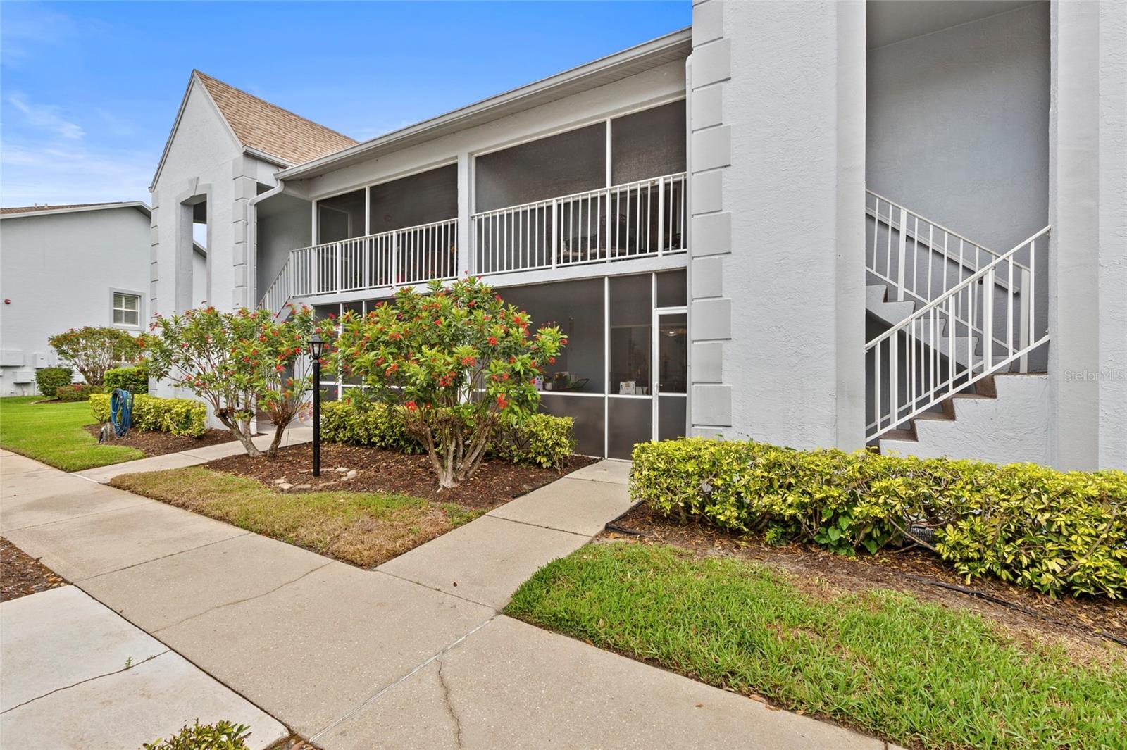 One or more photo(s) has been virtually staged. Updated First-Floor Condo with Golf Membership in Tara Golf & Country Club
Enjoy the Florida country club lifestyle in this beautifully updated first-floor Veranda condo located in the highly desirable Tara Golf & Country Club. This 2-bedroom, 2-bath home with a versatile den offers comfort, style, and convenience—ideal as a full-time residence or seasonal retreat. The freshly painted interior (2024) features updated lighting and ceiling fans throughout, along with new carpeting in the bedrooms and den. The spacious gourmet kitchen includes solid wood cabinetry, granite countertops, custom pantry storage, deep dual sinks, and new appliances (2024), including a bake/convection/air fryer range, flush-mount microwave, and dishwasher. A tray ceiling and open layout connect the kitchen seamlessly to the dining and living areas, creating a welcoming space for everyday living and entertaining.
Relax on either of the two screened lanais with new screening and privacy panels (2025). The rear lanai offers peaceful golf course views overlooking the sixth fairway—perfect for morning coffee or evening sunsets. The primary suite features plantation shutters, custom-designed walk-in closets, and a private bath with a walk-in shower and updated fixtures. The guest bedroom also includes plantation shutters and a custom closet system and sits conveniently near the second full bath. Additional highlights include a single-car enclosed garage, updated water heater (2024), and newer roof (2023).
Ownership includes a Class “A” Equity Golf Membership with full access to championship golf, practice facilities, clubhouse dining, fitness center, tennis, bocce, pickleball, and resort-style pool amenities. Ideally located near Lakewood Ranch, The Mall at University Town Center, Sarasota-Bradenton International Airport, and the Gulf beaches of Siesta Key and Anna Maria Island, offering the perfect combination of resort-style living and convenient access to the best of Florida’s Gulf Coast.