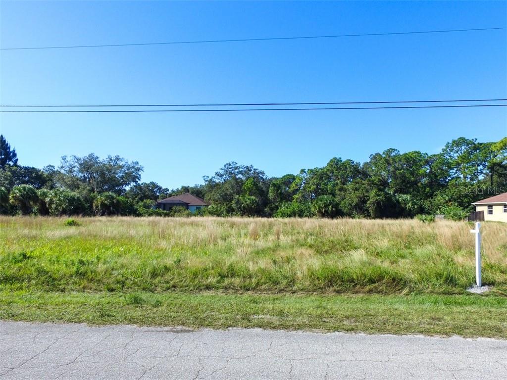 NOT FLOOD ZONE! ADDITIONAL LOT FOR SALE NEXT: LOT 8 N6140023 (for additional cost ask listing agent).
Investors Special! Oversized residential lot (RSF-3: Residential Single Family 3) in the Warm Mineral Springs neighborhood of North Port. This lot is within a short walking distance of the world-renowned Warm Mineral Springs, known world-wide for its healing waters!This Residential Lot sits in a quiet neighborhood minutes away from Warm Mineral Springs NOT IN A FLOOD ZONE or HOA or CDD. Excellent location, peaceful neighborhood, minutes from I-75 & Tamiami Trail! Convenient to Florida’s best beaches, golfing, public boat ramps, marinas, shopping, physicians, water park, Atlanta Braves Practice Stadium, Tampa Bay Rays Practice Stadium, Historic Riverfront Downtown Punta Gorda & Fishermen’s Village, and a short drive to Venice, Sarasota and Boca Grande, etc. All information deemed reliable, but not guaranteed; buyer to confirm all.