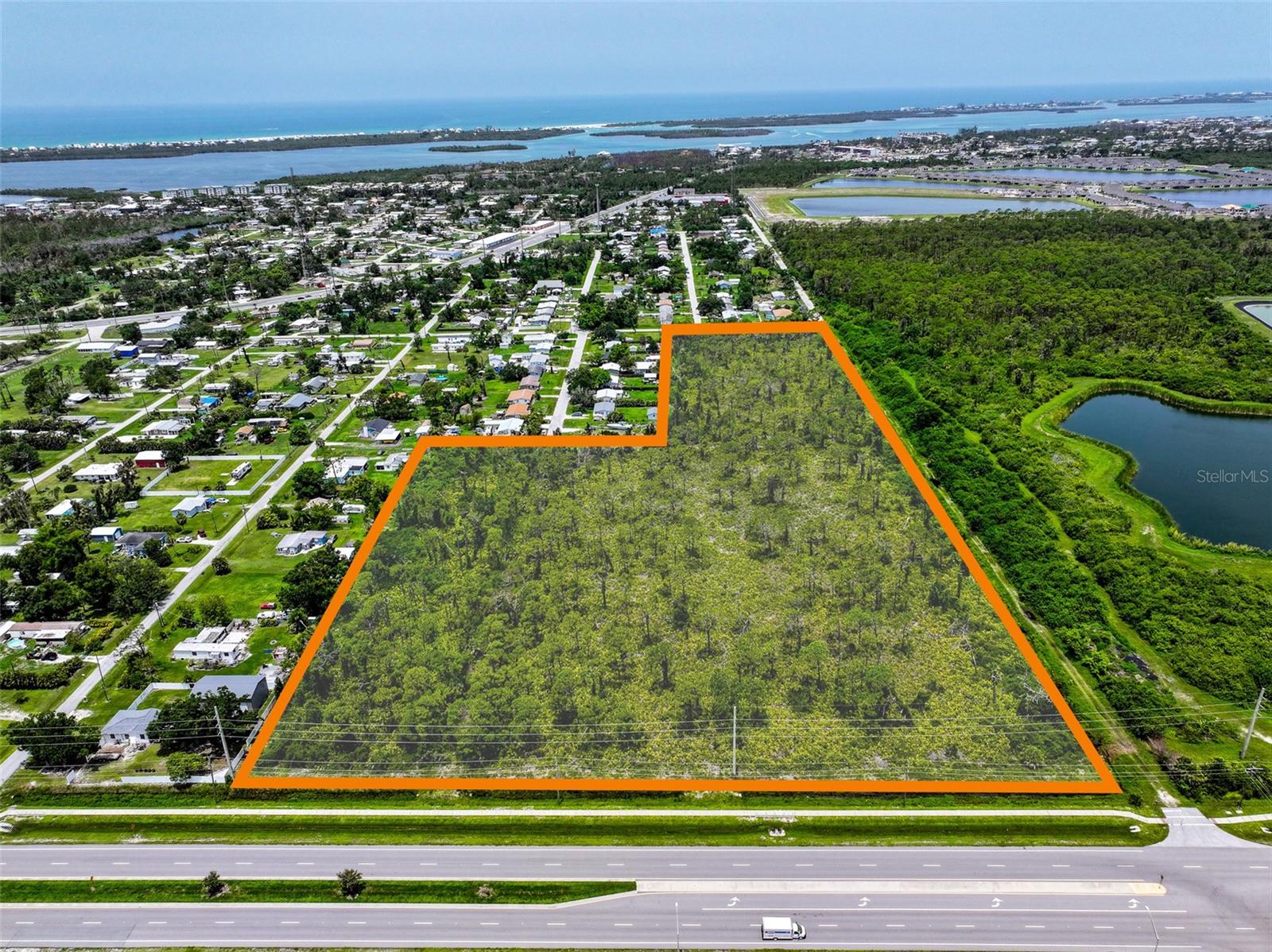 Located in the beautiful Englewood, Florida area lies this 15 +/- Are development site with frontage on the new Winchester Boulevard Extension. This new extension is the north-south connector bisecting historic Englewood from Englewood East and Rotonda as a new Central Boulevard. It provides access to South River Road (connecting to Interstate-75) and Placida Road to the south giving access to the world-famous Boca Grande. 

This offering consists of one to three parcels for development into retail, multi-family, or both.  Opportunities consist of either purchasing the entire site for retail development as it is already zoned CG - Commercial General, or multifamily development under the Florida Legislature's Live Local Act allowing multi-family development without a rezoning provided certain affordable housing criteria are met.  

Seller will also subdivide as two 1.2 +/- Acre future corner retail development sites with frontage on Winchester Boulevard and one 12.6 +/- Acre site that could be used for Multi-Family Development with partial frontage on Winchester Boulevard and partial frontage on the future Cypress Road. 
 
The multi-family residential site is located in an area that can utilize the Residential live local zoning allowing for apartments or a build-to-rent community on the site. Recent revisions to Live Local in 2025 assures that Charlotte County's "Transfer Density Unit" program does not impair implementation of the Live Local Act.

The 1.2+/- acre retail sites at the corner of Winchester Boulevard and Cypress Road could have the potential to be at a future traffic light. The lots are zoned Commercial General (CG) allowing for a variety of uses including Bank, Pharmacy, Gas Station, Retail, Car Wash, Restaurant, among others.

15 +/- total acres with Seller willing to subdivide into three lots:
 Parcel A: 1.2 +/- Acres - $875,000 Corner Lot Retail Parcel
 Parcel B: 1.2 +/- Acres - $775,000 Retail Parcel
 Parcel C: 12.5 +/- Acres - $4,950,000 Multifamily Parcel
 TOTAL: $6,600,000 for Entire Site