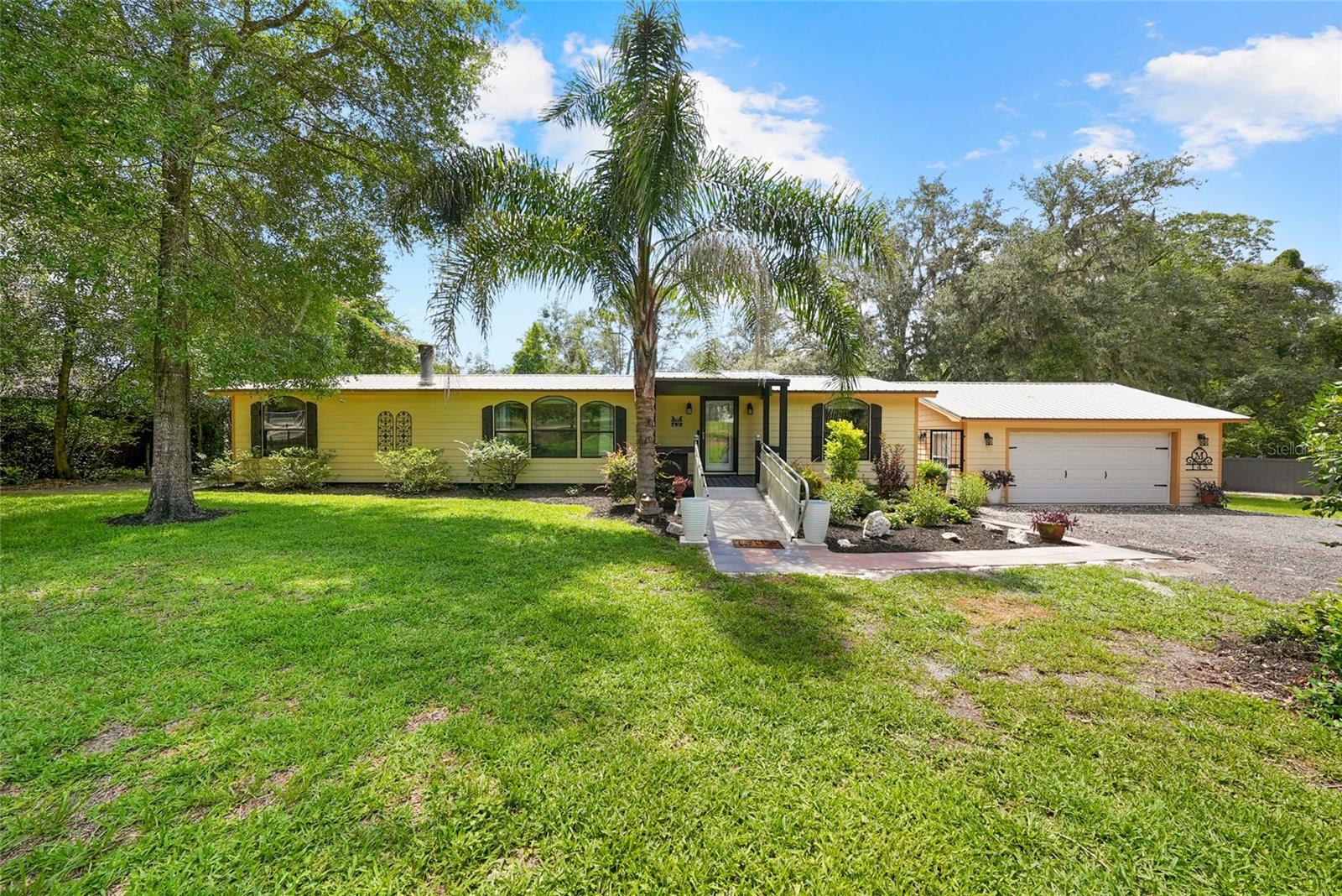 Welcome home to this beautifully renovated 3-bedroom, 2-bath double-wide manufactured home situated on 1.01 private, wooded acres. Just minutes from Lake Santa Fe! Thoughtfully updated from top to bottom, this move-in-ready home offers the perfect blend of modern comfort, peaceful surroundings, and everyday functionality. Step inside to an open and spacious floor plan featuring a cozy fireplace in the living room, a beautifully updated kitchen with a center island ideal for cooking and entertaining, and a charming built-in hutch in the dining area. Large windows fill the home with natural light, creating a warm and inviting atmosphere throughout.
Step outside to the expansive screened back porch, where you can relax with your morning coffee, entertain family and friends, or simply enjoy the beauty of nature from the comfort of your own backyard.
One of the property’s biggest advantages is in a NO Flood Zone, giving you added freedom and potential savings on ownership costs, has a shed and generator. Located just minutes from the charming town of Melrose, you’ll enjoy a welcoming community known for its local art galleries, community events, scenic parks, and quaint restaurants with outdoor dining. Conveniently located near Keystone Heights and Gainesville, you’ll have easy access to shopping, dining, healthcare, and everyday conveniences while still enjoying the tranquility of country living. This beautiful gem will not last long, book your showing today!