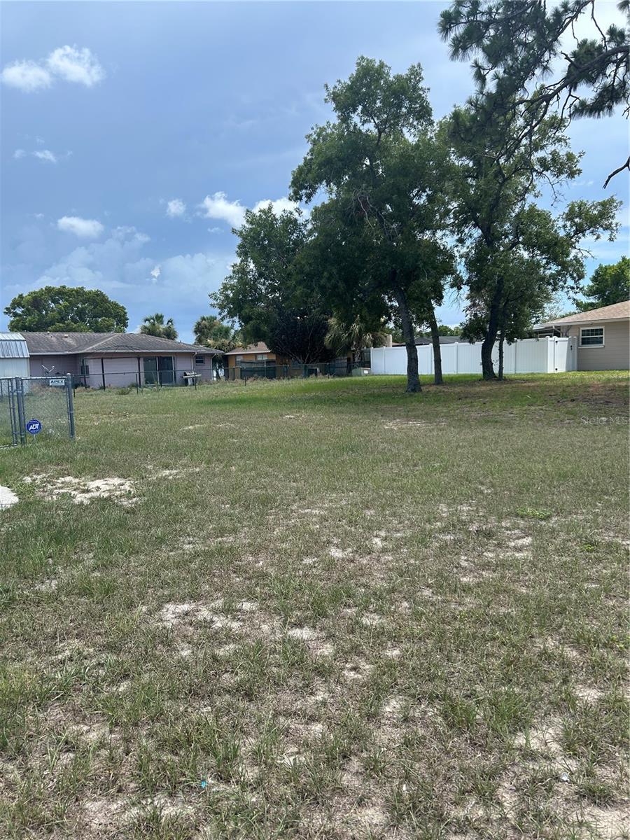 Save in clearing costs! This lot does not require much at all, flat level, partial concrete drive drive, good opportunity to start construction