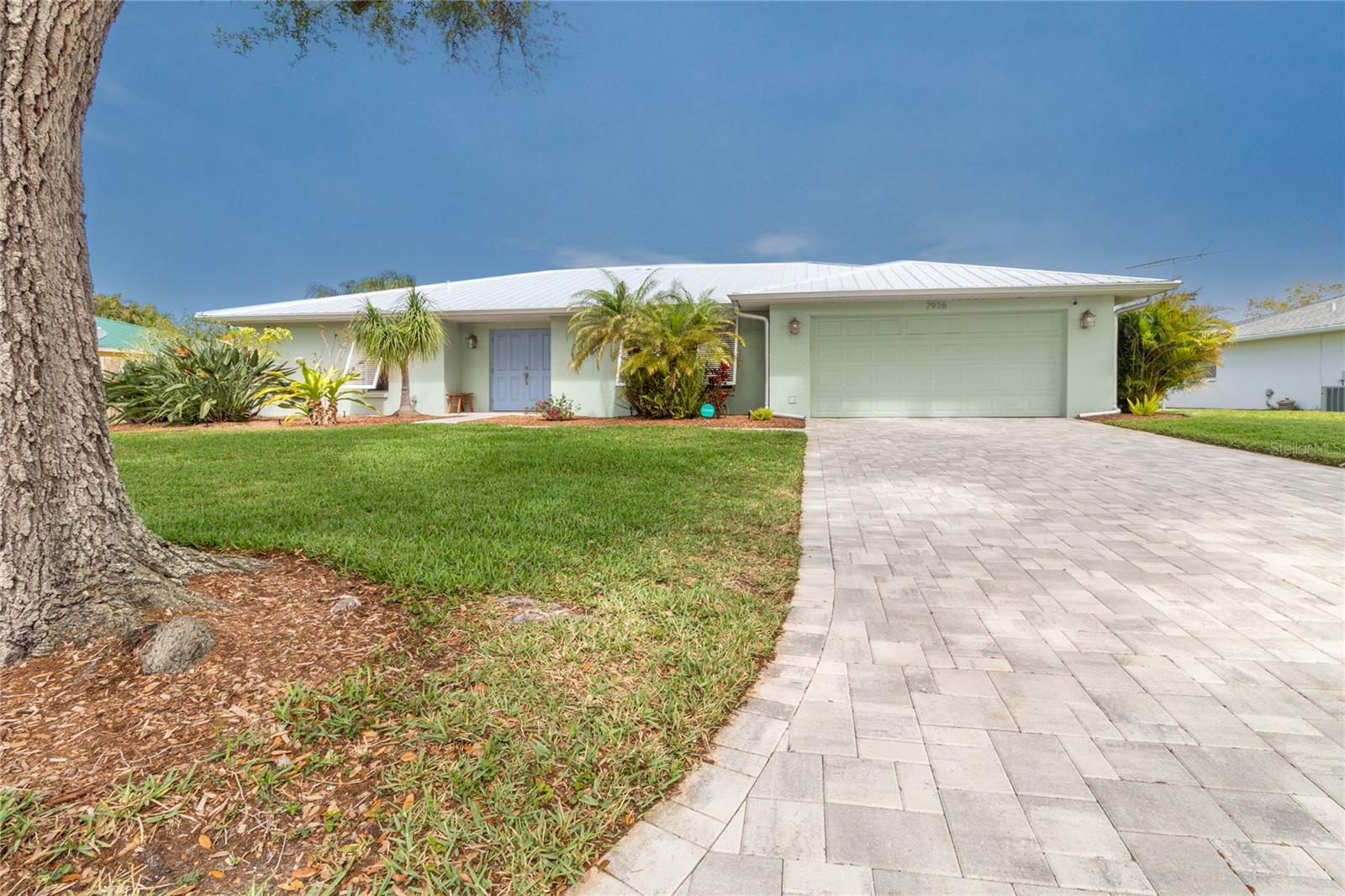 Experience luxury living in this fully updated home in the highly desirable Palm Aire community of Conservatory Estates. This beautifully designed Sarasota home offers a flexible split-bedroom floor plan with 2 bedrooms, 2 en-suite baths, and a spacious den/study that can easily convert to a third bedroom. The private primary suite features an oversized walk-in closet, while expansive light-filled living and dining spaces maximize comfort and functionality with exceptional space efficiency.

The chef’s kitchen showcases custom cabinetry, granite countertops, and new 2025 upgraded appliances, including a Bosch dishwasher, LG French-door refrigerator, ZLINE 600-CFM range hood, and GE induction cooktop with convection oven. Premium upgrades continue throughout the home with a state-of-the-art energy-efficient HVAC system, custom ductwork, hurricane-rated garage and entry doors, Bahama shutters, hurricane screens, and a new 2023 metal roof with updated fascia, soffits, gutters, and downspouts.

Step outside to a designer-landscaped backyard oasis featuring custom irrigation, lush green space, and a fully fenced private garden retreat visible from nearly every room. Located just minutes from UTC shopping and dining, Conservatory Park, golf courses, and Sarasota’s world-famous Gulf Coast beaches, this Palm Aire home combines elegant design, modern upgrades, energy efficiency, storm protection, and an unbeatable Sarasota location.
