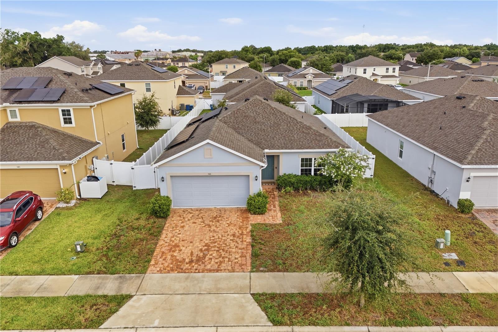 Seller motivated, bring your offers! Welcome home to this beautifully maintained 3 bedroom, 2 bathroom residence in the sought after gated community of Bella Toscana. Offering 1,545 square feet of comfortable living space on a fenced lot, this home delivers the perfect blend of privacy, security and convenience. Enjoy energy savings year round with solar panels, plus the peace of mind that comes with living behind the gates. Easy access to Ronald Reagan Pkwy, US 27 and I 4 puts Disney World, dining, shopping and top attractions just 15 to 20 minutes away. The community also features a park and playground for residents to enjoy. Don't miss this opportunity to own in one of Davenport's most desirable gated neighborhoods. Schedule your showing today.
