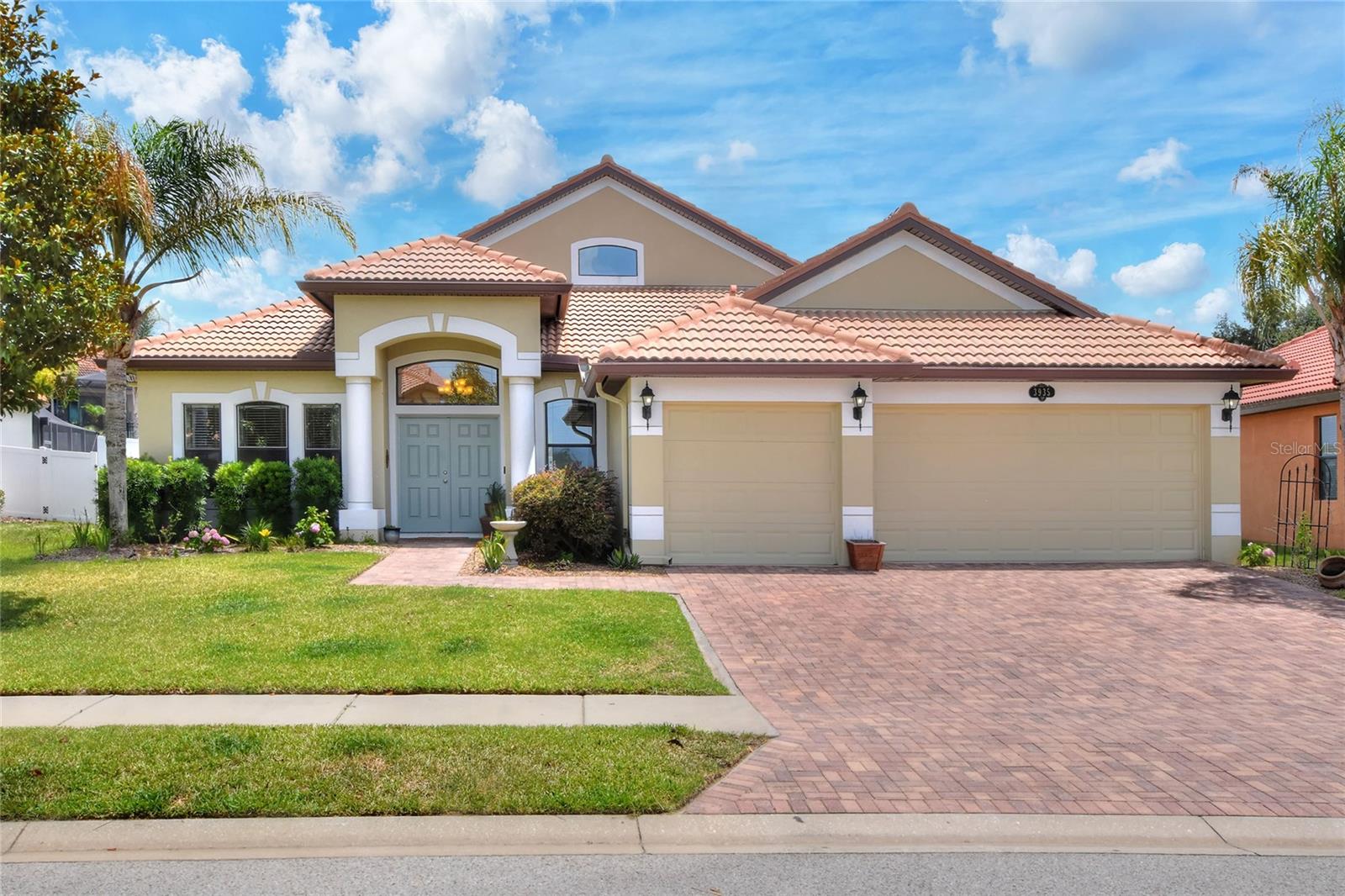 Welcome to the desirable and gated community of TerraLargo. Walk or jog the tree-lined sidewalks past beautiful landscaping to the tennis courts for a game of tennis, basketball or pickleball. Enjoy the resort style zero-entry pool, jetted spa, fully equipped fitness center, clubhouse with meeting space and locker rooms, covered playground, or lakefront gazebo. Pool has been resurfaced May 2026. HOA fees include all of this as well as cable and internet. Upgrade your life with this beautiful central FL home that boasts light and bright spaciousness. Entire interior has been freshly painted. All bedrooms have new LVP flooring and baseboards, making it easy and durable for pets and kiddos. Two large living spaces give plenty of room for the whole family, as well as a formal dining room and a breakfast space. The large kitchen boasts expansive granite countertops for barstool dining and all of your gadgets, and plenty of storage with 42 inch upper cabinets. There is a new dishwasher, under cabinet lighting, and updated custom shelving in the large pantry. Stay cool with your new energy efficient AC with smart thermostats and 10 year transferable warranty. Laundry room has updated wood shelves and a sink. Bonus room upstairs is very large, has a walk-in closet, and could be a playroom, office, media room, or teen room. Hall bath has a new tiled shower and bathtub. Home also has a floored attic and yard is privacy fenced, with sprinkler system, lemon and banana trees, and a relaxing under-truss back porch with pavers. The driveway pavers have been freshly refinished and Spanish tile roof has been professionally washed. All power lines are underground (great for storms). There is a wired security system. Garage has workshop storage cabinets and work table. Home is on a culdesac street - no through traffic. This is a quiet, established, and friendly community with easy access to I-4 and every local need or amenity. Your Florida lifestyle awaits!