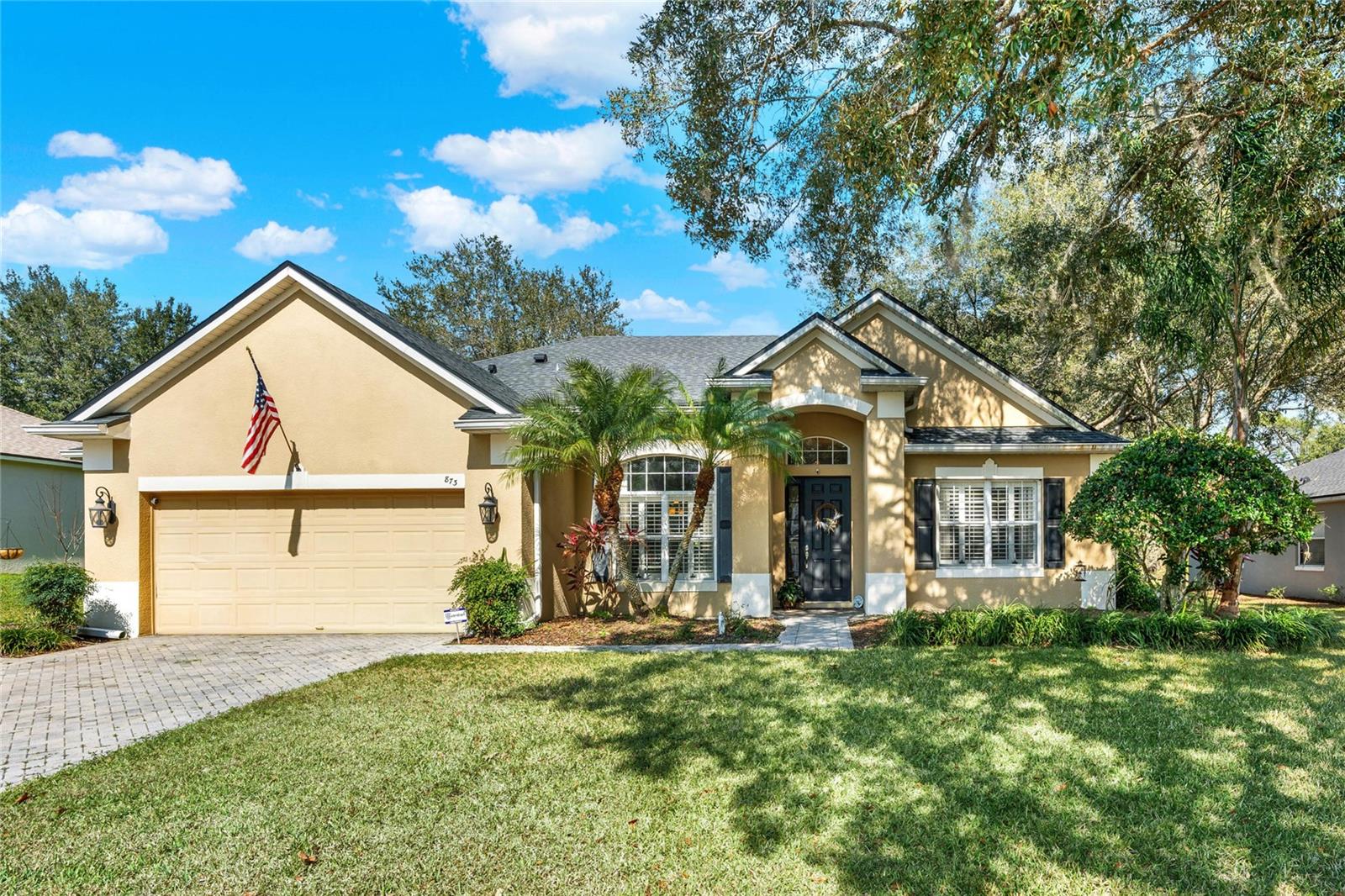 Welcome to this beautifully designed home in Apopka! This home includes 4 bedrooms and 3 bathrooms within 2,813 sq. ft. of living space. From the moment you arrive, the lush landscaping and spacious driveway create a warm and inviting curb appeal. Inside, you’ll find a thoughtfully designed layout that seamlessly connects living spaces, making both everyday living and entertaining feel absolutely effortless! Step inside, and you’re welcomed by formal living and dining rooms on either side, perfect for hosting gatherings with ease. As you move further in, the heart of the home unfolds into an open-concept family room, kitchen, and dinette area, where high ceilings, abundant natural light, and built-in shelving create a warm and inviting space everyone is sure to love. The chef’s kitchen is designed to impress, featuring crown-molded cabinetry, stainless steel appliances, a large island for additional prep space, and a breakfast bar for quick family meals. Whether you’re cooking for a crowd or preparing a simple dinner, this kitchen makes meal prep effortless while still allowing you to stay connected with loved ones in the family room, so you never miss a special moment. The primary bedroom is a private retreat, complete with its own entrance to the patio, a spacious walk-in closet, and a luxurious en suite bathroom. The spa-like bathroom boasts a large soaking tub, a separate shower stall, dual vanities, and a dedicated makeup vanity, making busy mornings feel like a breeze. Each of the additional bedrooms offers ample storage, abundant natural light, and plenty of space, ensuring everyone in the family feels at home. Step outside to the covered patio, ideal for al fresco dining, weekend barbecues, or simply enjoying the warm Florida weather. The expansive backyard is perfect for little ones, four legged friends, or even creating your dream outdoor oasis. Beyond the backyard, you'll enjoy stunning views of manicured green space and soon to be golf course, so you can have peace of mind knowing your backyard will be serene and quiet. Nestled in a prime location, this home is just minutes from Kelly Park and Wekiwa Springs, giving you easy access to the natural beauty of Central Florida, and is within a walk-able distance to a brand new K-12 school, amphitheater park, and other amazing amenities. With top-rated schools, shopping, dining, and quick access to the 429, you’ll have everything you need within reach. Don’t miss out on this exceptional home, schedule your private showing TODAY!!