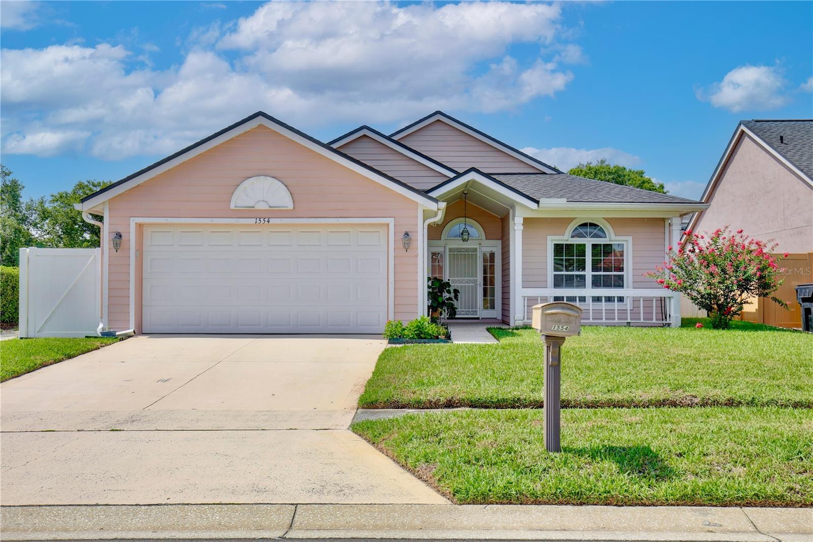 Welcome home to this beautifully maintained 3-bedroom, 2-bath home offering 1,562 square feet of bright, comfortable living in the heart of Apopka. Step inside to soaring vaulted ceilings and skylights that fill the home with natural light, creating an inviting and open feel. The kitchen features granite countertops and a functional layout perfect for cooking and entertaining. A spacious Florida room adds valuable flexibility, ideal as a workout area, second living space, or quiet retreat. It even includes a built-in doggie door with direct access to the fully fenced backyard — a standout convenience for pet owners. Outside, enjoy a private yard with plenty of room for pets, gardening, or outdoor gatherings. With major updates including repiping in 2019, a new HVAC system in 2021, and a new roof in 2023, this home offers peace of mind and long-term value. Located in an established community with a low HOA and just minutes from Lakeville Elementary School, shopping, dining, and major roadways, this property blends comfort, convenience, and modern upgrades into one compelling opportunity. Schedule your showing today!