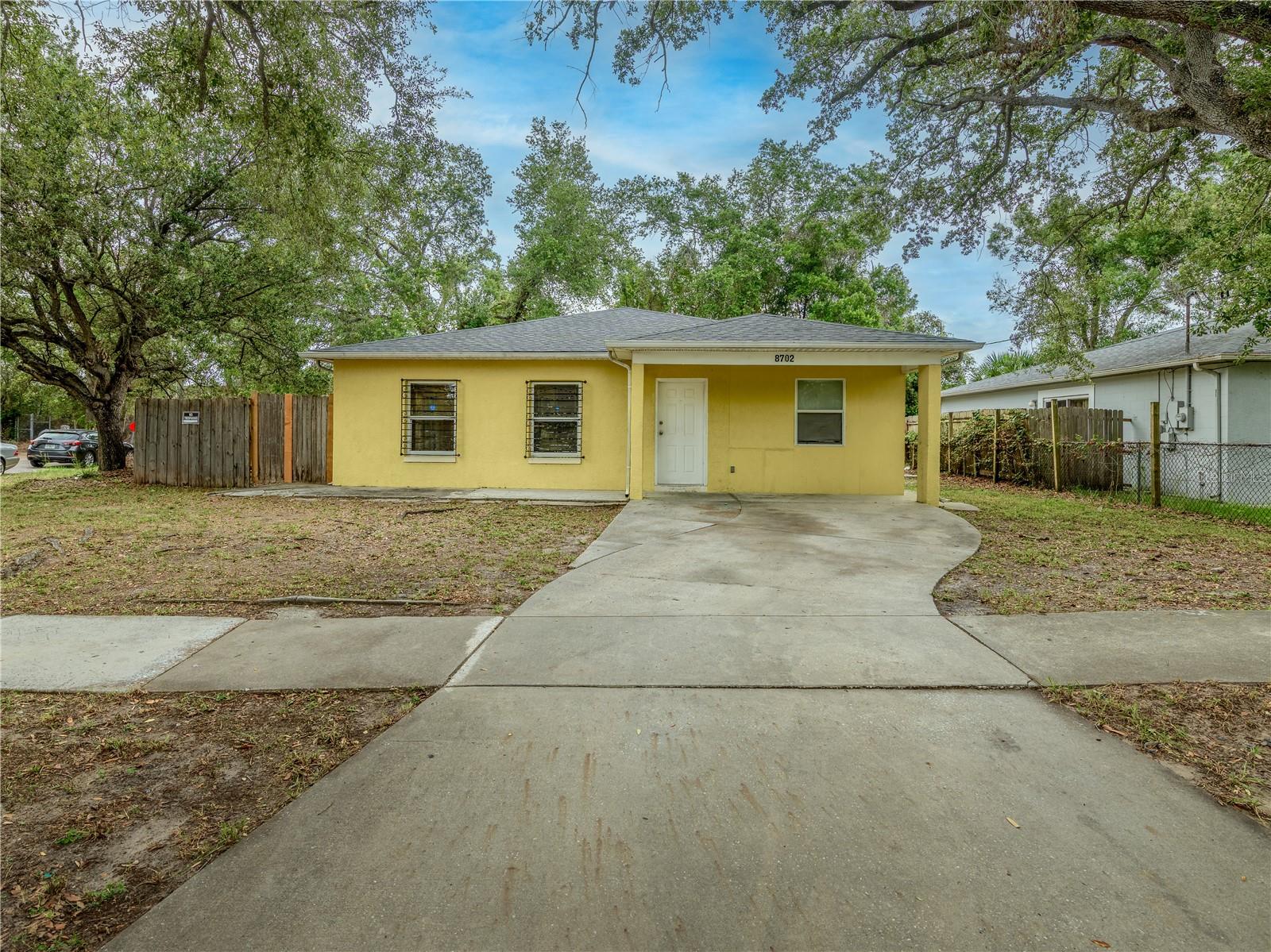 One or more photo(s) has been virtually staged. Welcome to this spacious 4-bedroom, 3-bathroom Single-Family Home.  This well-maintained property offers comfort, value, convenience and endless potential.  The versatile floorplan offers ample living space, a Primary Bedroom with an ensuite Bathroom, a Second Bedroom with a private Bathroom, a large backyard and a desirable location on a corner homesite.  Major updates provide peace of mind, including a roof, A/C system and water heater that are all approximately 2 years old.  Enjoy easy access to major highways, shopping, Downtown Tampa, dining, schools, and that the Tampa Bay area has to offer.  Whether you're looking for your primary residence or a great investment property, this property is one you won't wont to miss.  With NO HOA, you'll enjoy greater flexibility and fewer restrictions.  Schedule your private showing today!