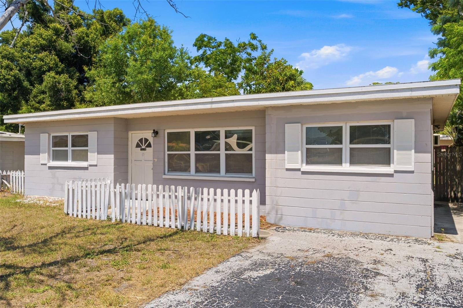 Opportunity awaits in the heart of Seminole! This 3-bedroom, 1-bath block home is ready for your vision and is full of potential for its next owner. Features include a spacious living room, an enclosed porch, a dedicated laundry room, and a primary bedroom with a walk-in closet, plus its own sink and vanity. Outside, you'll find a spacious, fenced backyard with plenty of room to enjoy. Whether you're looking to add to your investment portfolio or create a home that's uniquely your own, this property is full of possibilities. Conveniently located near shopping, dining, beaches, and parks.