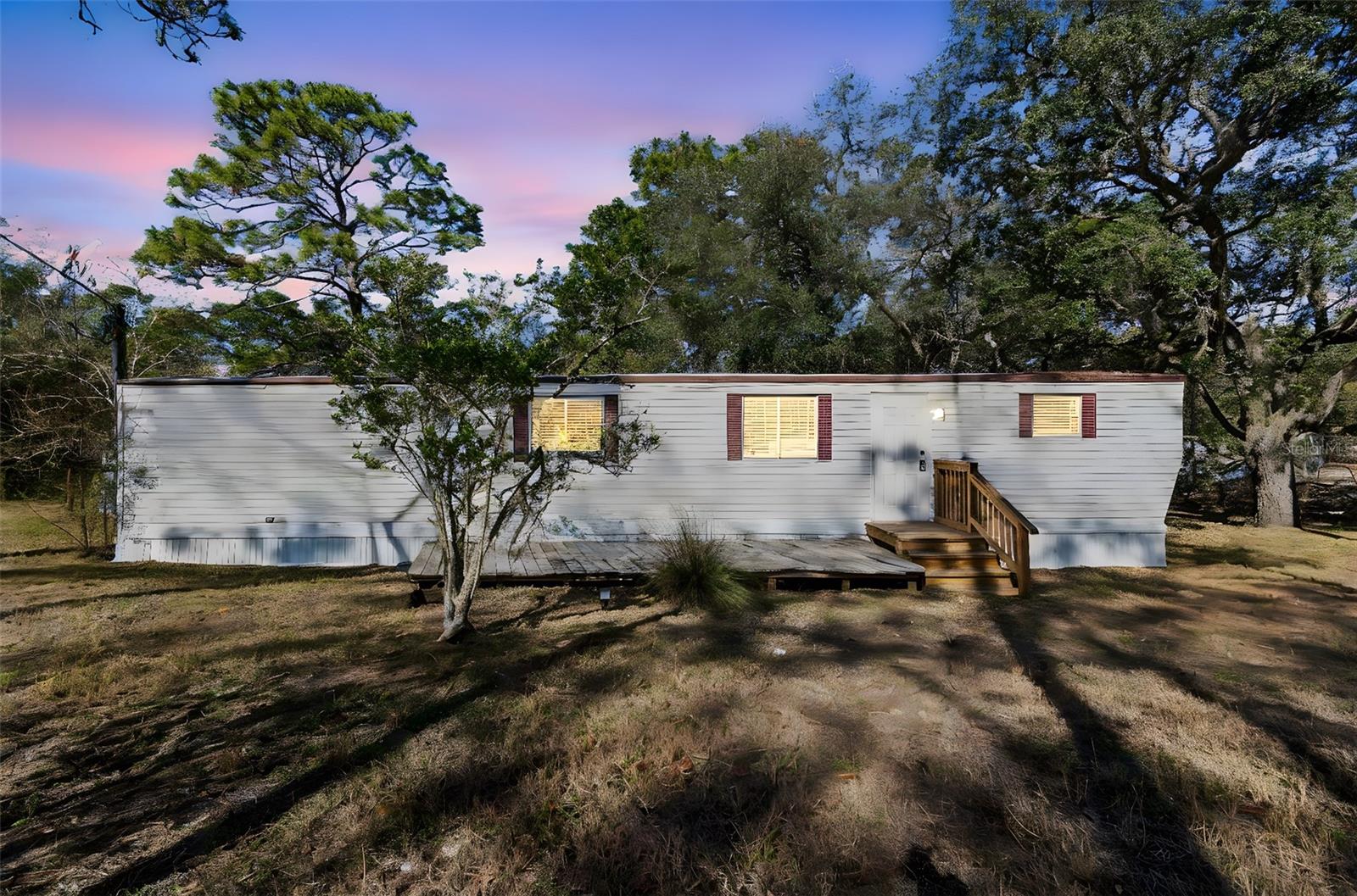 Discover the charm of rural living in this beautifully updated single wide manufactured home, nestled on a generous half-acre lot in Homosassa right near the heart of Crystal River, Florida. Perfectly positioned between Tampa and Ocala, this property offers the tranquility of the countryside with convenient access to urban amenities. Zoning allows for chickens, ducks, rabbits, even pigeon or quail!

Step inside to find a home that has been thoughtfully refreshed, blending modern updates with cozy comfort. The interiors feature inviting living spaces, updated finishes, and plenty of natural light. Whether you’re starting out, downsizing, or searching for a weekend retreat, this home is move-in ready and waiting for your personal touch.

Outside, the half-acre lot provides ample space for gardening, outdoor hobbies, keeping of chickens or other pets, or simply enjoying the serene surroundings. Zoned rural, the possibilities here are endless—dream of adding a workshop, parking your RV, or even expanding your outdoor living area. See attachment for zoning regulations.

Located just a short drive from Crystal River’s renowned springs, world-class fishing, and vibrant downtown, this home lets you embrace the best of Florida’s laid-back lifestyle. Don’t miss your chance to own an updated gem in a peaceful, sought-after location!