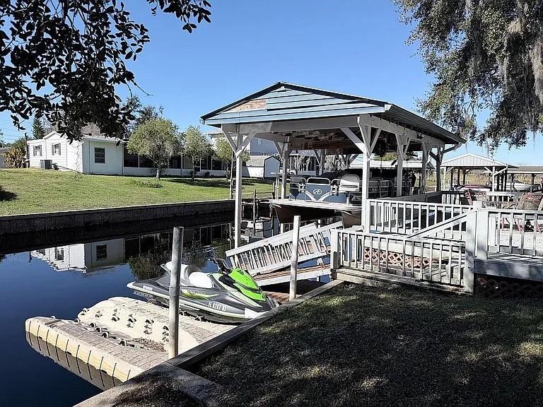 Rare canal-front opportunity with direct access to the scenic St. Johns River! Nestled in Palm Shadows, this move-in ready waterfront home is ideal for boating enthusiasts, anglers, nature lovers, and anyone seeking a true Old Florida lifestyle. Enjoy your newly repaired private dock with motorized boat lift and keep your boat just steps from your door. Double-pane windows and a large 25-foot screened porch provide comfort and the perfect place to unwind while overlooking the canal. With no HOA and no lease restrictions, you'll enjoy the freedom to use the property as a primary residence, seasonal retreat, weekend getaway, or investment property. Hard-to-find waterfront properties with river access, private docking, and unrestricted ownership opportunities are becoming increasingly rare. Start living the waterfront lifestyle you've been dreaming about.