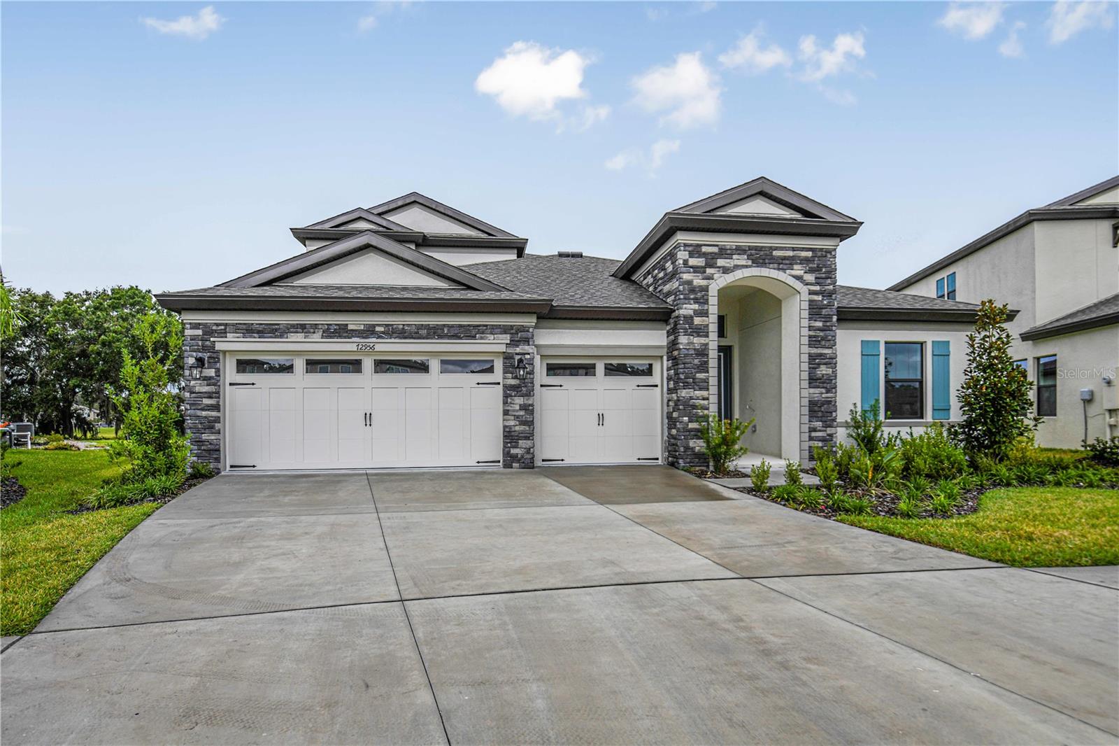 For a limited time, Homes by WestBay is offering $46,000 towards buyer’s closing costs, pre-paids, rate buydowns, or off the price of this home. Promotion amount is specific to this home only.
This Bayshore II Quick Move-In home is READY NOW! This home features our “Tranquil Transitional" Design Collection interior: Kinsdale Maple Slate cabinets, Snow Flurry Quartz counter-tops, Floorte Prominence Plus Executive Oak LVP flooring, and more. The Bayshore II offers easy living with an open floorplan, while still offering privacy for the owner's retreat and secondary bedrooms. Follow the wide foyer to the heart of the home—a combined grand room, deluxe kitchen and casual dining that blends to outdoor living with access to the large covered lanai. From the grand room, enter the owner’s retreat complete with dual walk-in closets and well-appointed master bath. Upstairs, a bonus room, bedroom and additional bathroom provide extra living space. 

Hawkstone is a master-planned community located in Lithia, FL. Residents enjoy the best of both worlds with resort-style amenities while staying close to top-rated Lithia schools, nature preserves, family-friendly activities, US-301, and I-75. Enjoy the pet-friendly hiking trails at the 969-acre Triple Creek Nature Preserve, less than 2 miles south or try your hand at bicycle motocross at Triple Creek BMX, 1 mile south of Hawkstone.

Images shown are for illustrative purposes only and may differ from actual home. Completion date subject to change. 
Exterior claimer statement: Exterior image shown for illustrative purposes only and may differ from actual home.
Completion date subject to change.