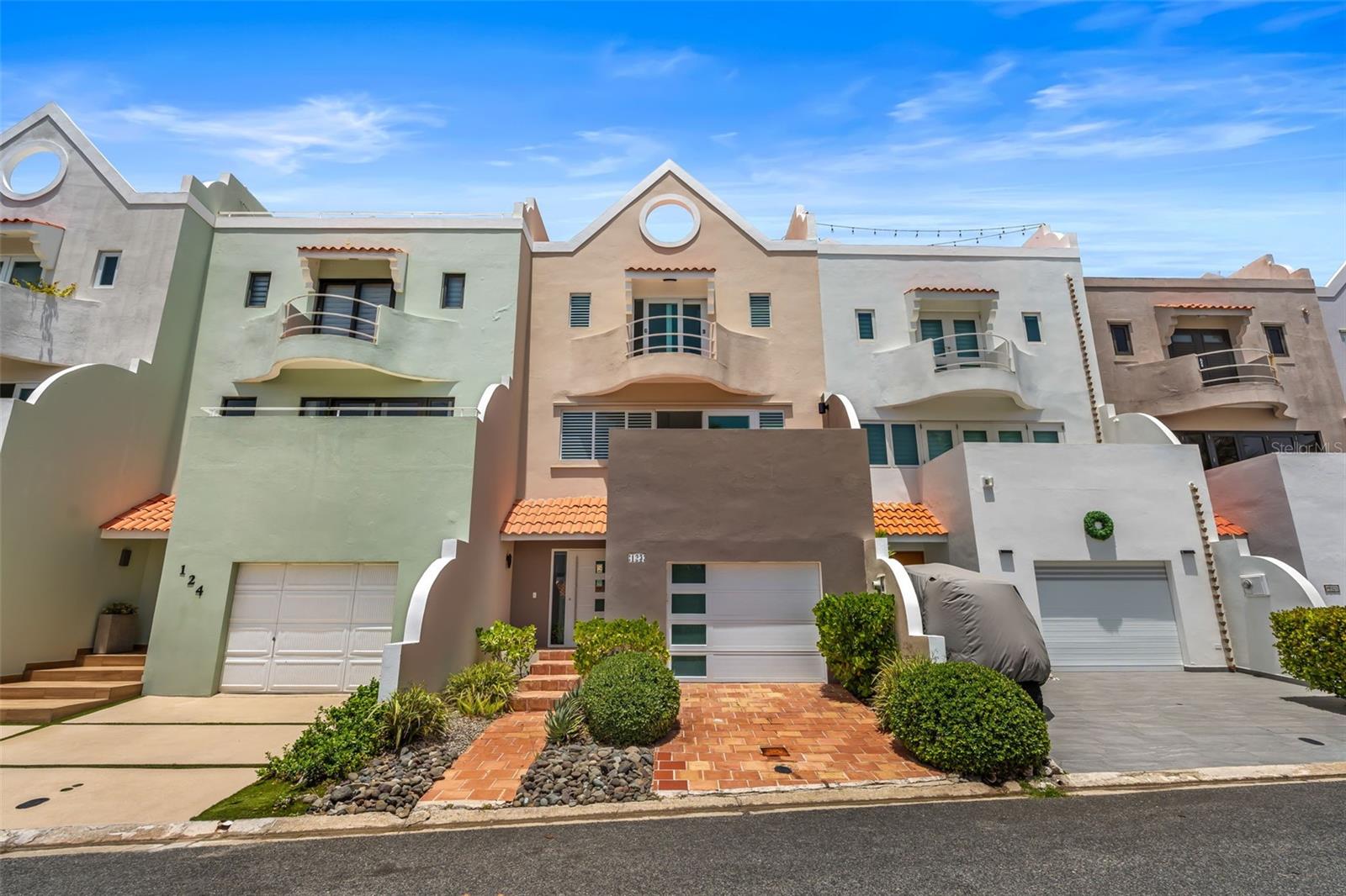 Experience resort-style living in Palmas del Mar in this fully equipped, three-story townhouse villa offering 1,997 sq. ft. of living space plus 531 sq. ft. of additional non-living areas. The property features three bedrooms, each with a private balcony, two full bathrooms, one half bathroom, an open terrace with a private pool, and a rooftop terrace with beautiful views. Additional highlights include a private garage with storage and allowance for short-term rentals. Palmas del Mar offers world-class golf courses, equestrian trails, marina facilities, a tennis club, beach club, skate park, playgrounds, shops, a variety of restaurants, and much more.