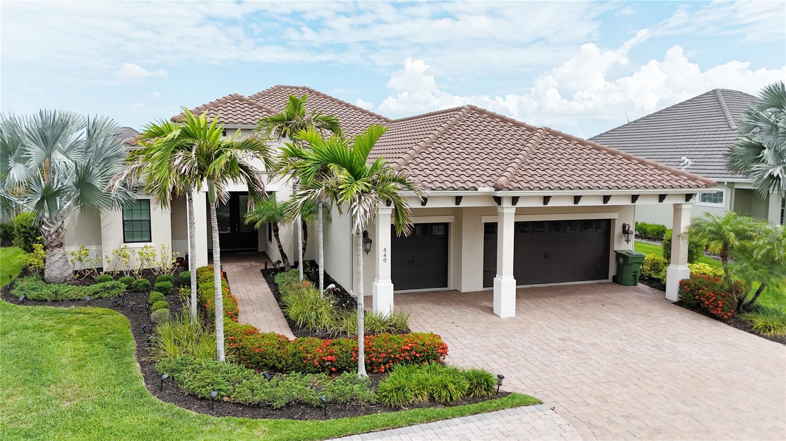 Experience Florida waterfront living at its finest in this furnished 3-bedroom, 3-bathroom single-family residence offering 2,918 square feet of thoughtfully designed living space. Situated within a desirable gated community, this exceptional home enjoys a picturesque canal-front setting with boat slip availability (separate approval process), providing convenient access for boating enthusiasts.
The spacious open-concept floor plan seamlessly connects the living, dining, and kitchen areas, creating an ideal environment for both everyday living and entertaining. Large windows and sliding glass doors invite abundant natural light while showcasing tranquil water views.
Step outside to your private tropical retreat featuring a sparkling pool, expansive screened lanai, and an outdoor kitchen with breakfast bar—perfect for hosting family and friends or simply enjoying the Florida lifestyle year-round.
Additional highlights include a generous primary suite, well-appointed guest accommodations, ample storage, and an oversized 3-car garage. Combining comfort, elegance, and waterfront convenience, this exceptional property offers the ideal blend of luxury living and recreational enjoyment in a secure community. This property can also be made available unfurnished.