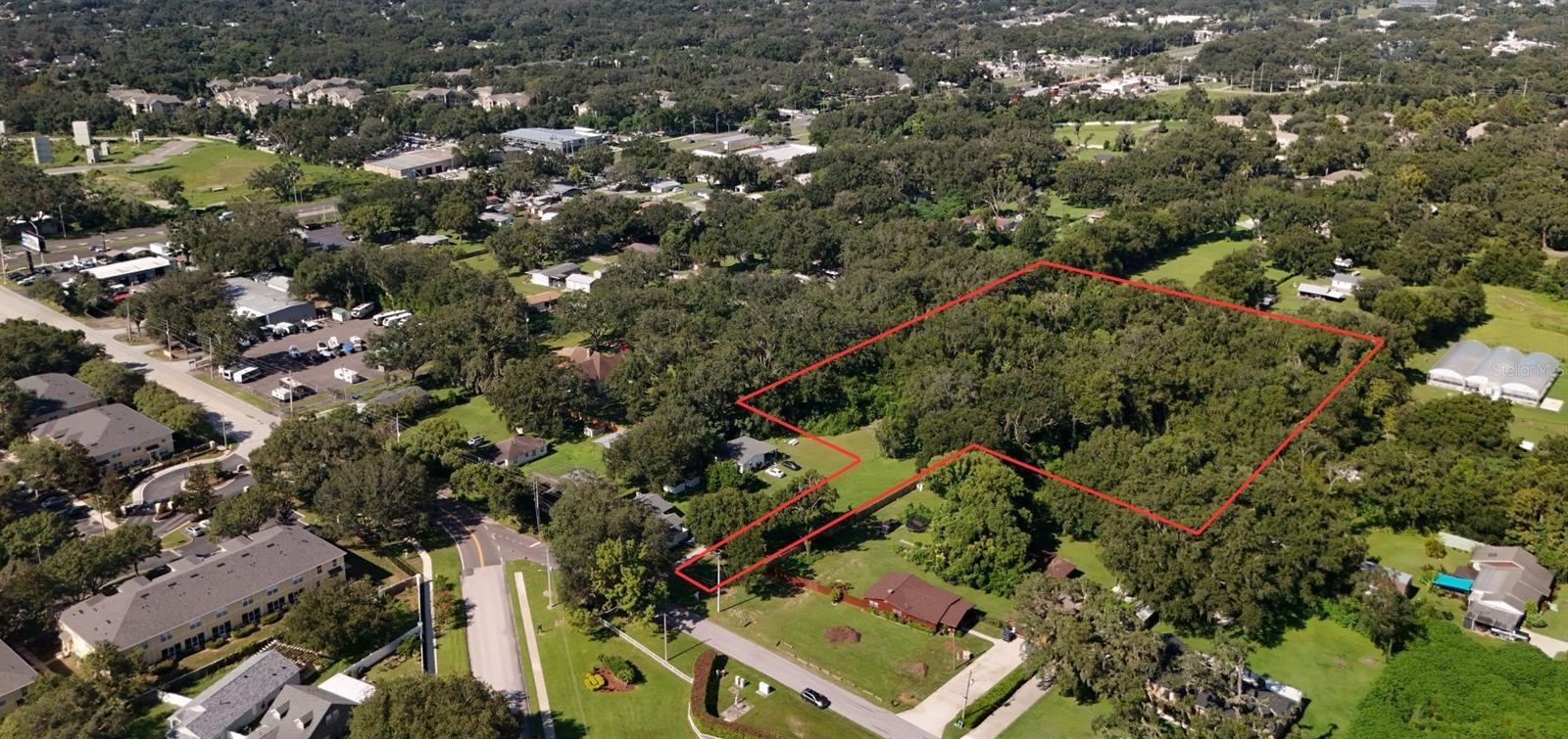 Rare opportunity to own 3.36 acres in the heart of Valrico with no HOA or deed restrictions. This expansive vacant parcel offers a beautiful natural setting with mature oak trees and approximately 50 feet of road frontage, creating a sense of privacy while still being conveniently located near Hwy 60 for easy access to Tampa and the surrounding areas. Zoned ASC-1 with a Future Land Use designation of R-4 (buyer to verify zoning, land use, and potential uses), this property presents a unique opportunity for a custom home site or long-term investment. Large acreage parcels like this are becoming increasingly limited in the area. Whether you're looking to build now or secure land for the future, this property offers flexibility and value in a growing market.