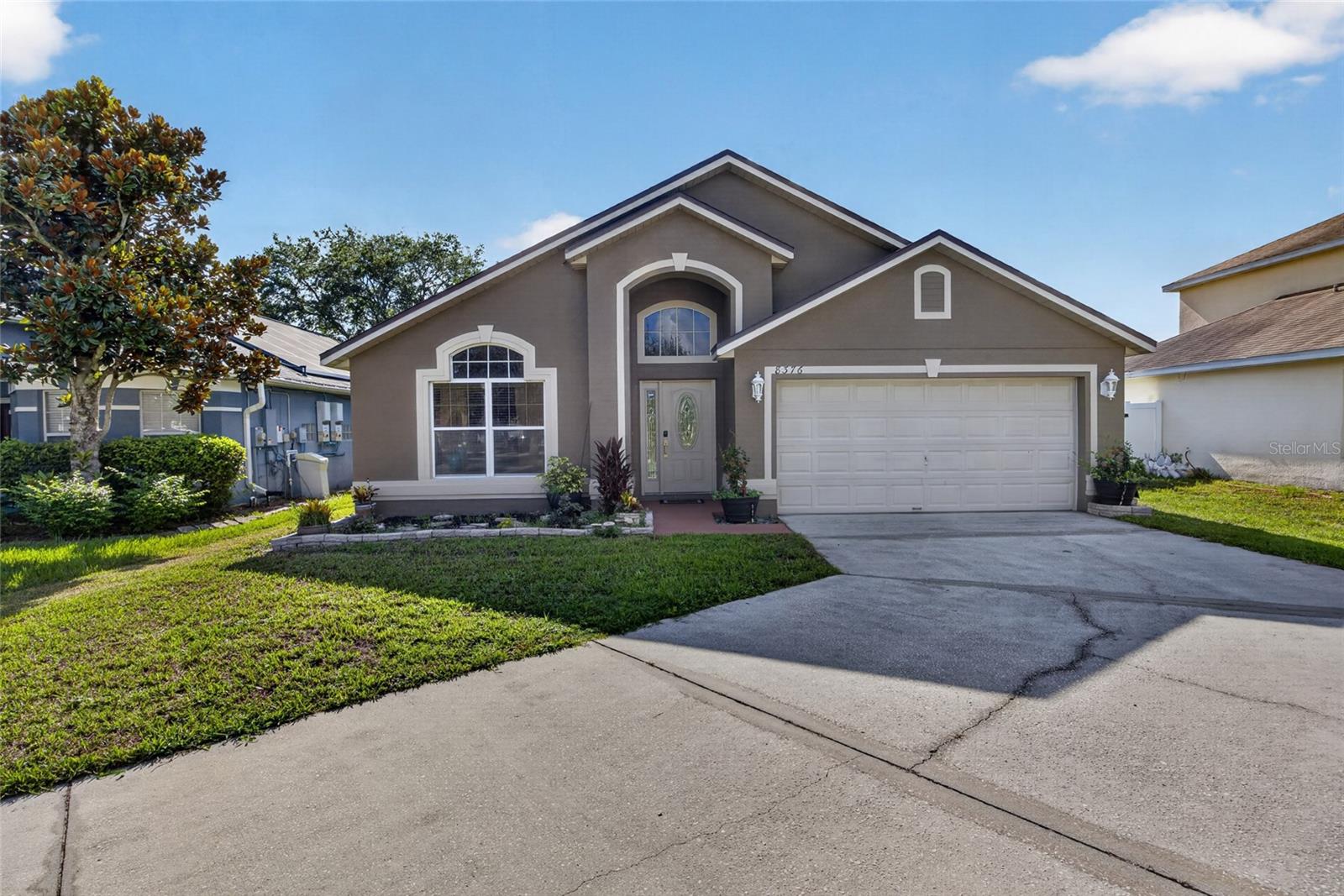 Seller is highly motivated! Discover this beautifully maintained single-story home situated on a landscaped corner lot in Orlando’s highly sought-after Vista Lakes community. Offering 4 bedrooms, 2 bathrooms, and over 2,100 square feet of thoughtfully designed living space, this residence features soaring vaulted ceilings, abundant natural light, and an open-concept layout perfect for both everyday living and entertaining. The spacious kitchen showcases solid wood cabinetry, a breakfast bar, and a cozy eat-in nook overlooking the inviting family room. The private primary suite offers a generous walk-in closet and a relaxing en-suite bath, creating the perfect retreat at the end of the day. Step outside to a covered rear porch and lush backyard, ideal for enjoying Florida evenings. Residents of Vista Lakes enjoy resort-style amenities, including pools, fitness centers, tennis courts, playgrounds, and scenic walking trails. Centrally located just minutes from SR-417, Orlando International Airport, Downtown Orlando, premier shopping, dining, and zoned for Vista Lakes Elementary School, this home offers the perfect blend of comfort, convenience, and lifestyle.