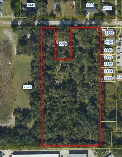 Rare builder’s opportunity! This massive 4.21-acre lot in Kissimmee offers 227 ft of road frontage and total land utility, allowing for residential use, this high and dry parcel with no HOA is the perfect canvas for a private luxury estate, a family compound with guest houses, or a hobbyist’s paradise. Access is via W Martin St, which is city-maintained and paved, ensuring a clean and easy commute. Its proximity to U.S. 192, Osceola High, and Disney makes this a prime strategic investment. Whether you build your dream home or hold for future development, this oversized parcel combines maximum privacy with unbeatable urban convenience. Don't wait for the "Pending" sign! Visit this beautiful lot now and take action before someone else beats you to it.