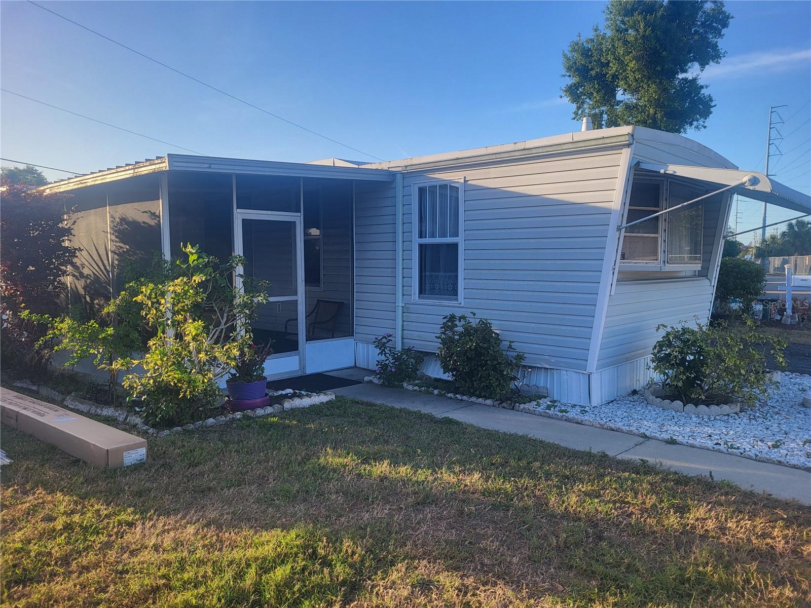 Holiday Village, all age, pet friendly, no lot rent, low community association fee ($160/mthly).   2/1.5 furnished with screened lanai, storage shed and carport. Updated kitchen, bathroom. Central a/c.   Greenbelt across the street.  Adjacent to the Pinellas Trail, minutes to Madeira Beach. Seminole City Center, restaurants and fitness centers nearby.  Not a flood zone, high and dry.  Furnished or not.
Well maintained and ready to move in.  No renting/leasing.  Buyer approval required.  Cash only.