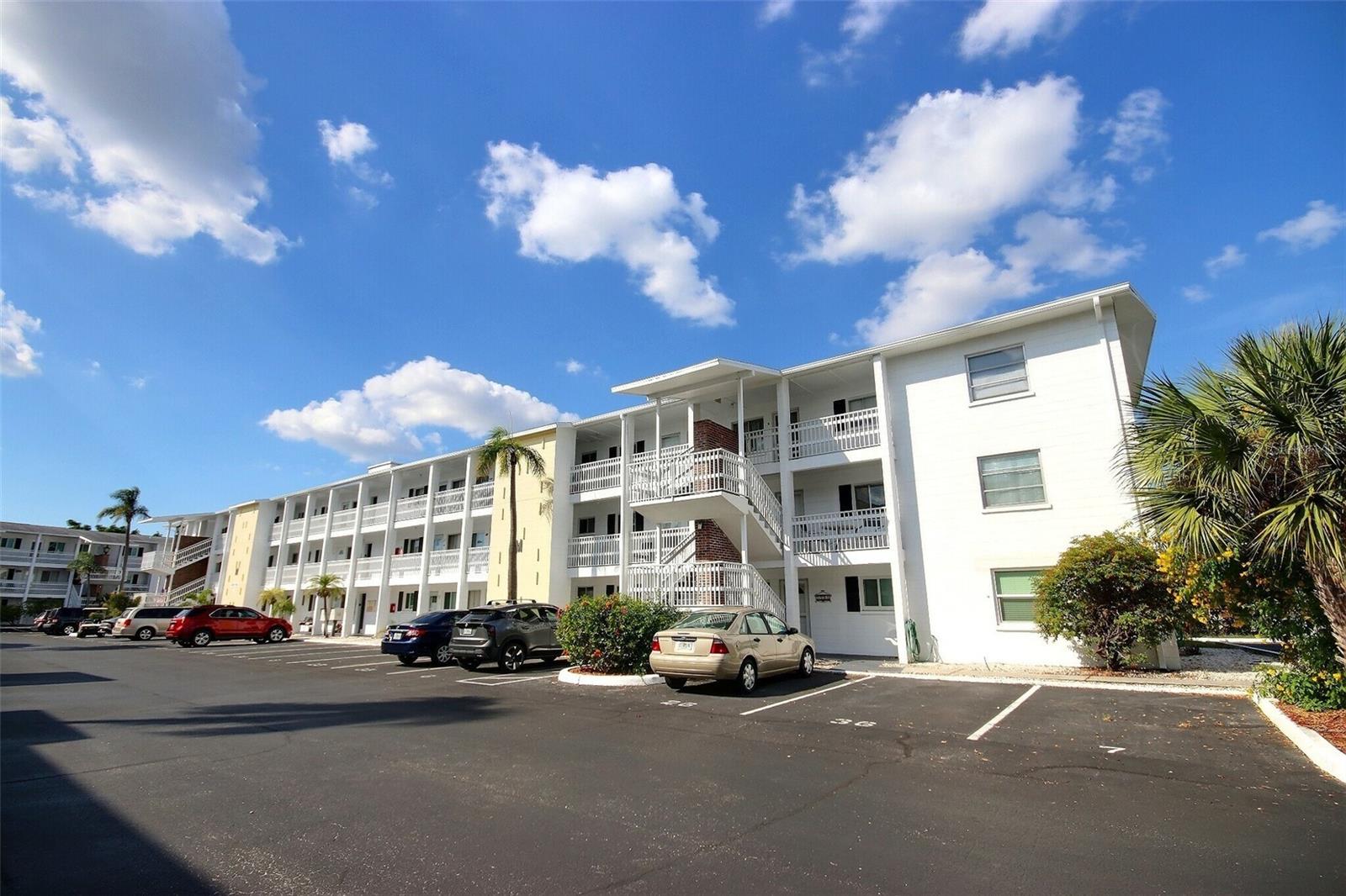 Welcome to this freshly renovated one-bedroom, one-bath condo located in the well-established 55+ Bayshore Gardens community of Bradenton, Florida. This move-in-ready unit features brand-new flooring, fresh interior paint, new blinds, and an updated kitchen with new appliances, refreshed cabinetry with new hardware, a new kitchen sink, and new countertops. The bathroom has been tastefully refreshed with a new vanity and toilet, and major system upgrades include a new air conditioner and new water heater for peace of mind. The building offers elevator access for added convenience, and the unit includes one assigned parking space with additional guest parking available. Bayshore Gardens residents enjoy a variety of community amenities, including a swimming pool, shuffleboard courts, clubhouse, and on-site laundry facilities. Ideally situated near shopping, dining, medical facilities, and everyday conveniences, this condo is also just a short drive to downtown Bradenton, Sarasota, Lakewood Ranch, and the beautiful Gulf beaches, making it a great option for full-time living or a seasonal Florida retreat.