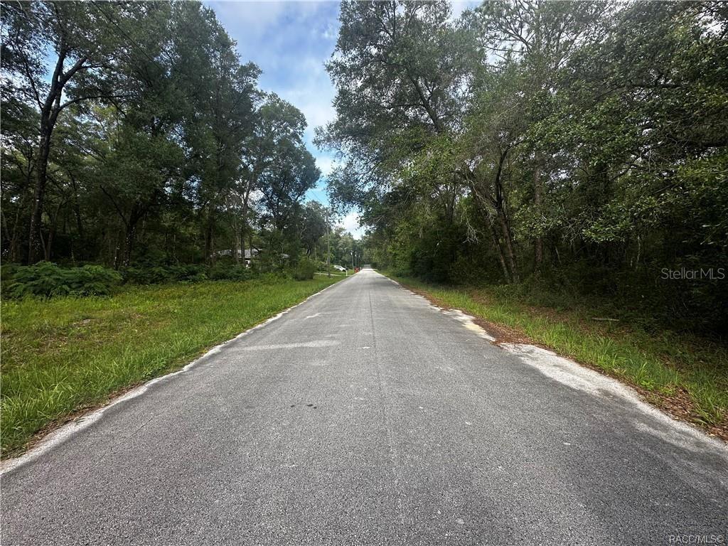 Build or invest with absolute confidence on this beautifully prepared, 0.33-acre vacant lot located at 3698 E Johnson Place in the desirable Inverness Highlands North subdivision of Citrus County. Offering rare zoning flexibility, this parcel accommodates a Single-Family Residential home, a Mobile Home, or a Multi-Residential development, making it an incredible opportunity for builders, homeowners, and investors alike. The heavy lifting has already been done for you—the underbrush is fully cleared, a professional survey is readily available, and markers are clearly set at each corner to define your boundaries. This high and dry property provides the ultimate freedom to quickly start your project without the strict limitations or immediate prep work found on other lots. Convenience meets natural beauty in this prime Inverness location, where you are just minutes away from essential city amenities, including local shopping centers, top-rated doctors, and medical hospitals. Beyond the daily conveniences, the area is an outdoor enthusiast's paradise; the renowned Inverness Chain of Lakes is just a short drive away, offering endless opportunities for premier boating, championship bass fishing, and scenic kayaking. With a cleared third-of-an-acre ready to build, a fresh survey in hand, and maximum zoning versatility, this Citrus County gem delivers the ultimate blend of accessibility, utility, and Florida charm.