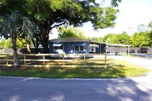 Welcome to this spacious and inviting home, where there's plenty of room for everyone, including your furry friends! This property boasts a large lot of 1.25 acres, perfect for pets to roam and play. Additionally, the large lot offers plenty of room for parking and outdoor activities. With its convenient location and unique features, this property is a must-see for anyone looking for a home with space and functionality! The detached garage features a post lift, providing the ideal space for all your mechanician needs. Whether you're working on cars as a hobby or a profession, this garage is sure to impress. For added privacy and security, the entire property has been fenced, providing a safe space for pets and family to play. Don't miss out on this opportunity to own a beautifully  home on a spacious 1.25-acre lot - schedule your showing today!