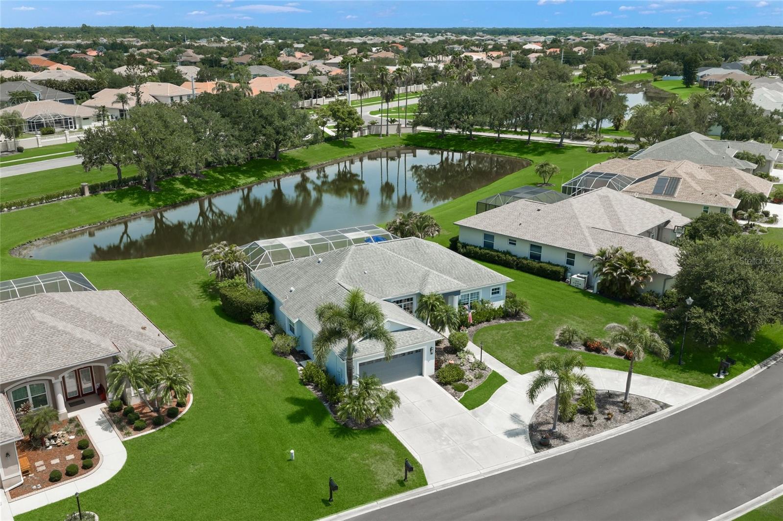This is the one * WELCOME TO THIS IMMACULATE HOME SITUATED ON A PRIVATE LAKE FRONT LOT with an EXTENDED CAGED LANAI FEATURING A LARGE INGROUND POOL * From the minute you enter this home you will realize you've found something special * The open floor plan is perfect for entertaining family & friends or just relaxing in your slice of paradise * With an ABUNDANCE OF NATURAL LIGHT the high ceilings & French doors will lead you to your OUTDOOR OASIS * The SPACIOUS Great Room features volume ceilings and a separate Dining Room * The LOVINGLY RENOVATED Kitchen is open to the Great Room for that modern floor plan * Bedrooms are a split plan design * Primary Suite has a sitting area and a must-see THOUGHTFULLY REIMAGINED SPA-style BATH * The Den could be used as a 4th Bedroom * This former model home built by Rinehart Homes will not disappoint * Make it a must show! * All of this wraps your Pool & Lake Views * 2nd Garage with a circular driveway for additional parking * Beautiful curb appeal *  THIS THOUGHTFULLY REIMAGINED HOME IS READY FOR YOUR FAMILY - ALL THE RENOVATIONS ARE DONE - ALL YOU HAVE TO DO IS MOVE IN! * Country feel yet 5 minutes to the NEW Publix shopping plaza & Rothenbach Park * 20 minute drive to Siesta Key Beach or UTC Mall * "A" RATED Tatum Elementary * One look & you'll fall in love * REALTORS: BE SURE TO READ THE REALTOR REMARKS PRIOR TO SHOWING & WRITING AN OFFER *