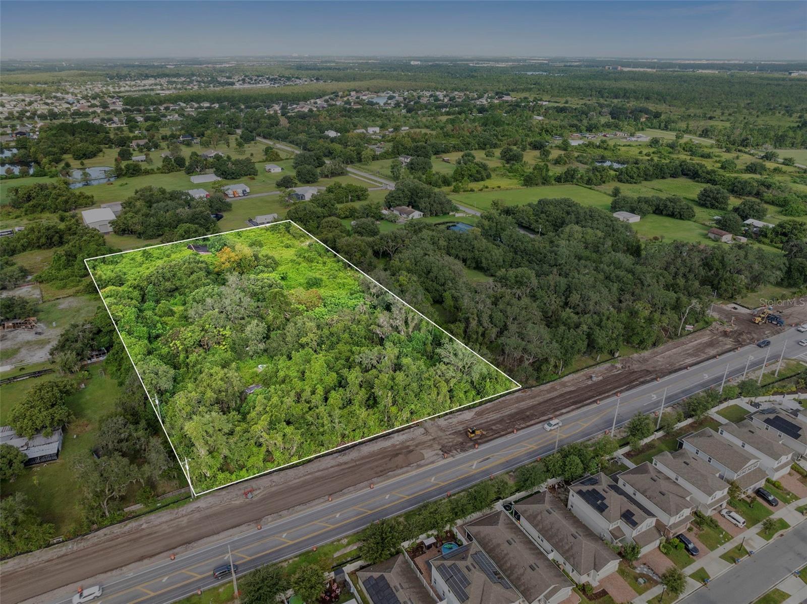Prime 5 acre Industrial Development Land with 301 FF on Boggy Creek Rd.  This parcel can be combined with the parcel next door to create 10 continguous acres and 615 FF on Boggy Creek Rd.  The county has approved a comprehensive land use amendment change. This parcel has a future land use of Industrial Restricted and can easily be converted to IR. The allowable uses are attached to this listing.   Boggy Creek Rd is currently being turned into a 4 Lane Road.  There will be a stop light at Boggy Creek and Timber Rd.  The areas proximity to Lake Nona and the tourist corridor and major highways make this a prime location for Industrial uses.