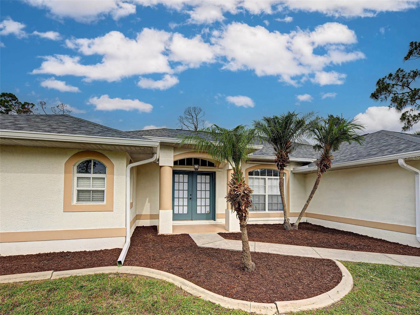 Check out this beautifully updated home in a highly desirable North Port location, offering both privacy and convenience just off the beaten path. This 3-bedroom, 2-bath, 2-car garage pool home has been completely refreshed and is truly move-in ready.

Enjoy a bright and open split floor plan featuring both a living room and a family room, perfect for entertaining or relaxing. The home showcases fresh interior updates including new flooring, fresh paint throughout, and a brand-new roof for peace of mind.

The kitchen flows seamlessly into a cozy dinette area with stunning aquarium-style glass windows overlooking the sparkling pool, along with a breakfast bar and charming breakfast nook. Cathedral ceilings and multiple sliding glass doors, including pocket sliders, provide abundant natural light and easy access to the outdoor living space.

Step outside to your screened-in pool area and covered lanai, ideal for enjoying Florida living year-round. Whether hosting guests or unwinding in your private retreat, this home offers the perfect blend of comfort and style.

Don’t miss your opportunity to own this North Port gem—schedule your showing today.