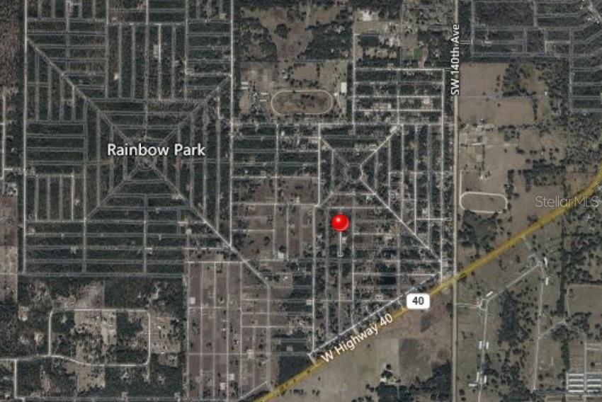 Build your future in the growing community of Rainbow Park in Ocala. This vacant lot presents an excellent opportunity for builders, investors, or buyers ready to design a custom home in one of the area’s expanding locations. Conveniently situated near shopping, dining, parks, and the World Equestrian Center, this property offers both flexibility and potential with no HOA restrictions.