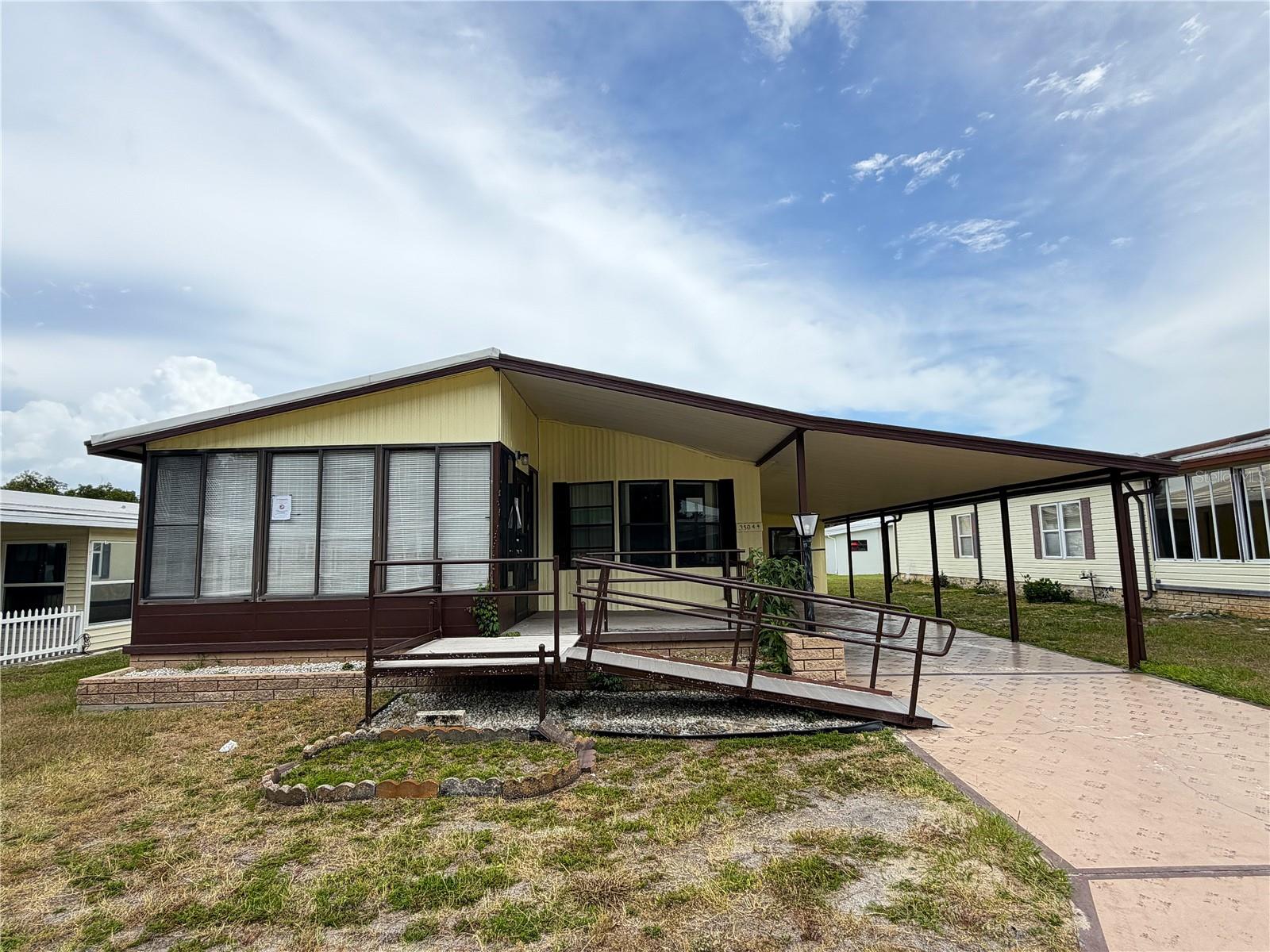 Virtually Staged. Opportunity awaits in the desirable Colony Hills community of Zephyrhills! This two-bedroom, two-bath mobile home offers a great opportunity for investors, flippers, or buyers looking to build equity with a little hard work. The community is well maintained and showcases true pride of ownership, while offering a convenient location just minutes from restaurants, shopping, medical facilities, and everyday conveniences. The home is in need of TLC and some elbow grease to restore it to its former glory, making it an excellent value for the right buyer. Cash or rehab  financing is strongly suggested due to the property's current condition. Priced to sell—don't miss this opportunity, because this one won't last long at this price!