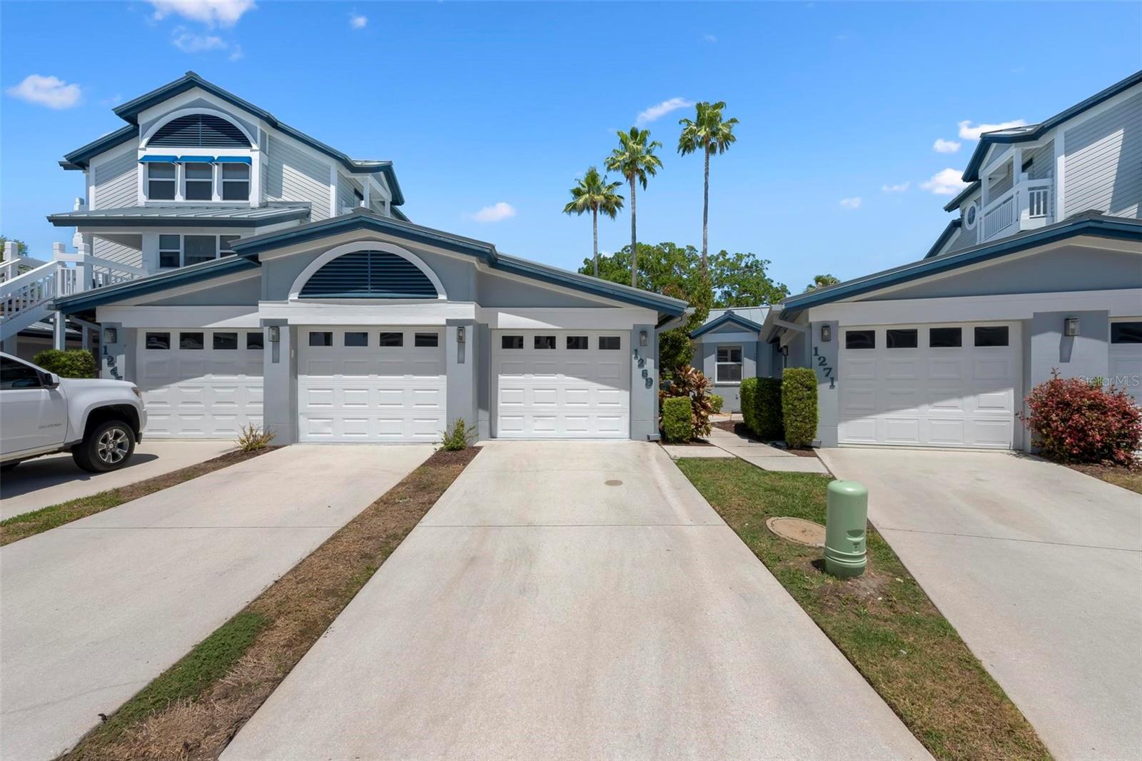 A first-floor 2-bedroom, 2-bath residence in Gulf and Bay Club Bayside with no unit above, offering added privacy and direct access. An optional second garage is available for purchase under a separate bill of sale.

Located on Siesta Key, an eight-mile barrier island consistently recognized among the top beach destinations in the United States and globally, Siesta Beach has been ranked the #1 beach in the United States and #4 in the world by Tripadvisor’s Travelers’ Choice Awards and has also been included on Travel + Leisure’s list of the World’s 50 Best Beaches as the top-ranked beach in the U.S.

This unit offers 1,280 square feet and is being sold turnkey furnished. The interior has been recently updated and includes a kitchen with new appliances. Luxury vinyl flooring runs throughout the main living areas and the lanai, with tile flooring in the bathrooms and kitchen.

The layout provides functional living space suitable for full-time use, seasonal occupancy, or rental use. A full-size washer and dryer are located within the unit.

The living area opens to views of a protected nature preserve. The community allows weekly rentals, providing income potential. The property was not impacted by recent hurricanes.

Ownership includes one private garage, with a second garage available for purchase under a separate bill of sale.

Residents have private beach access to Siesta Key’s shoreline, known for its quartz sand and calm Gulf waters, along with community amenities including two pools, tennis courts, and a gated entrance with on-site management.

This property may be used as a primary residence, seasonal property, or income-producing rental.