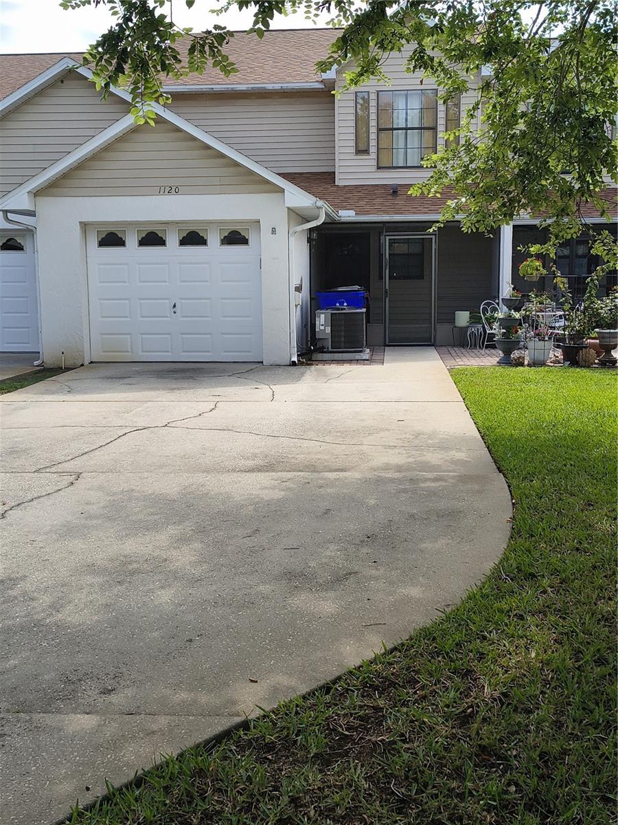 Beautiful 3 bedroom 2.5 bath/1 car garage townhome in the heart of Saint Cloud! Just blocks from the lakefront and just steps to the St Cloud library and shopping. Master Bedroom is located on the Ground Floor and Plenty of Parking in the back. Very Low HOA!!!! Huge covered Back Porch. HOA includes Lawn Maintenance.