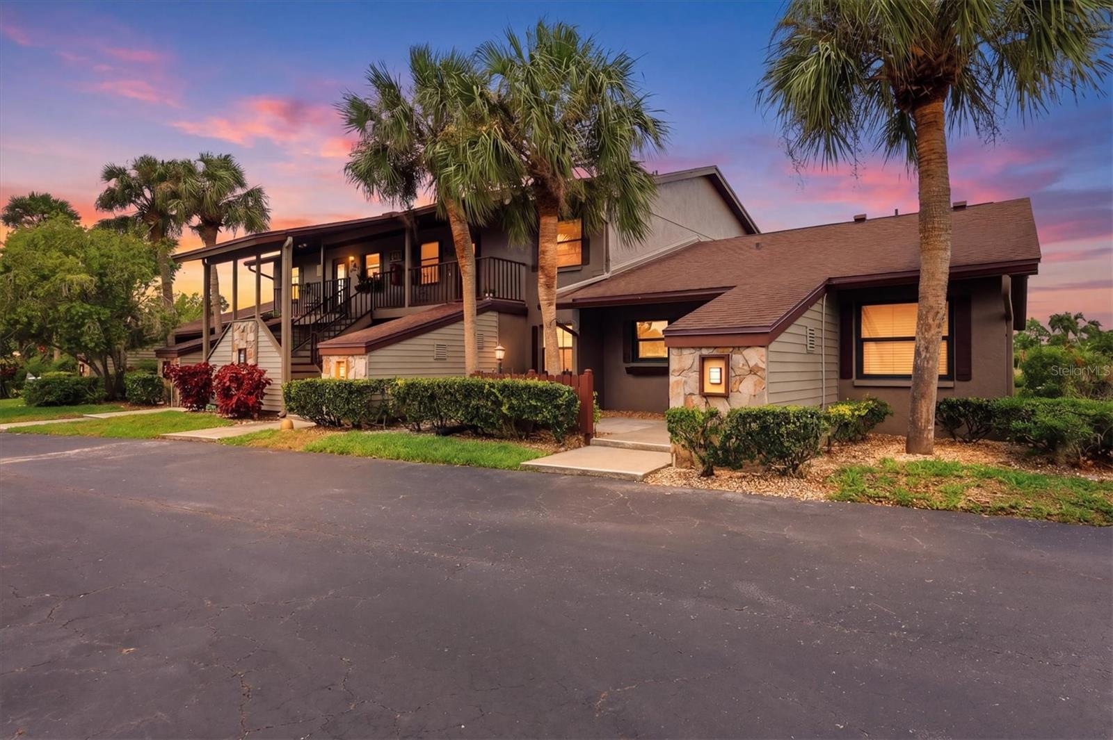 Your perfect Florida escape awaits. Located in the Par Four community overlooking the Capri Isles Golf Course, this turnkey furnished and beautifully updated Venice Florida condo offers the kind of view people wait years to find.

From the second-floor lanai, the elevated western-facing views create incredible sunsets nearly every evening, while the scenery changes throughout the day between golfers passing through the 17th and 18th holes, wildlife gathering around the lake, and the peaceful backdrop of the course beyond. From sunrise coffee to sunset skies, the lanai quickly becomes your favorite place in the home.

Inside, vaulted ceilings and expansive sliders fill the living space with natural light and frame the incredible golf course and water views beyond. Beautifully furnished in a clean coastal style, the condo feels bright, welcoming, and instantly relaxing.

The renovated kitchen offers beautiful granite countertops, updated cabinetry, newer stainless appliances, generous prep space, and bar seating ideal for casual everyday living or entertaining guests. Luxury vinyl plank flooring and tile run throughout the home with absolutely no carpet. The bathroom has just been completed with a brand-new walk-in shower and glass enclosure, while the primary bedroom connects to its own private vanity and sink area for added comfort and functionality. Additional updates in recent years include a newer washer and dryer, updated plumbing with re-piping, and extensive interior renovations throughout, creating an easy, move-in-ready lifestyle from day one.

Designed for easy living without sacrificing scenery, this Venice golf course condo works beautifully as a full-time residence, seasonal Florida condo, or perfect winter escape. Quiet, convenient living is paired with easy access to Venice Island, Gulf beaches, shopping, dining, golf, and the Sarasota Memorial Hospital Venice campus.

Easy to maintain, easy to leave, and even easier to enjoy.

The Par Four community offers a heated pool, clubhouse with fully equipped kitchen, assigned parking, and additional storage. Whether gathering with neighbors, hosting visiting family and friends, or simply enjoying a relaxing afternoon by the pool, the community is designed to make everyday living feel effortless.

The HOA includes cable, water, sewer, and trash, and the association is financially sound with strong reserves. Plus, with no CDD fee, no flood insurance requirement, and no flooding damage from recent storms, ownership becomes even more manageable and stress-free.

Quiet mornings with coffee overlooking the water. Evenings spent watching the sunset from your lanai. This is the kind of condo that reminds you why people move to Venice in the first place.