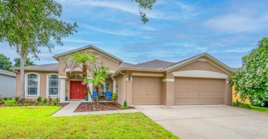 GORGEOUS HOME + FABULOUS LOCATION... Everyone loves the highly sought-after "Windsor" floor plan! This sprawling one-story home offers just under 3,000 square feet of beautifully updated living space featuring 4 bedrooms, 3 full baths, a private home office, and a spacious bonus room. The stunning kitchen is equipped with 42-inch solid wood cabinetry, stone countertops, a deep stainless-steel sink, stainless appliances, a pantry, breakfast bar, and abundant prep space. You'll appreciate the luxury vinyl plank flooring (30-year warranty) throughout, along with the freshly painted interior and numerous upgrades including NEW ROOF ( 2023), modern lighting, sinks, faucets, door hardware, and hinges. Privately situated at the rear of the home, the spacious owner's suite features a luxurious ensuite bath with beautiful granite countertops and two walk-in closets. The desirable 3-way split bedroom layout provides exceptional privacy for family and guests. French doors open to an oversized bonus room connected to the fourth bedroom and a full bath, creating the perfect in-law suite, guest retreat, or flex space. The expansive great room flows seamlessly to a covered lanai overlooking the fully fenced backyard with plenty of room to add a pool, making outdoor entertaining a breeze. Reclaimed water irrigation helps keep your lawn and landscaping lush while reducing utility costs. Ideally located in the heart of FishHawk Ranch, within the FishHawk Creek Elementary school zone and just moments from top-rated schools, resort-style amenities, four community pools, fitness centers, sports complexes, Park Square, playgrounds, and miles of scenic walking and biking trails. Conveniently located near shopping, dining, MacDill Air Force Base, downtown Tampa, and Florida's award-winning Gulf beaches. This is the one you've been waiting for—schedule your private showing today!