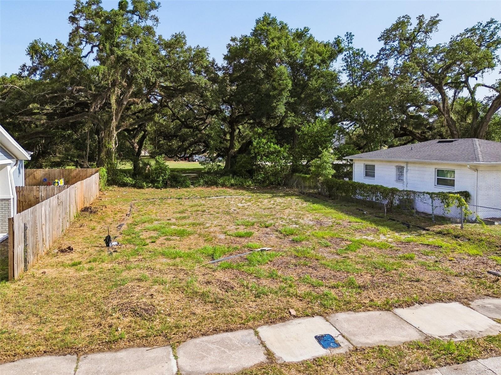 Excellent opportunity to build in one of Tampa's fastest-growing redevelopment areas. This 52' x 90' (4,680± square foot) residential lot is zoned RS-50 and is located within the established Smith Viola Revised subdivision. Whether you're a builder, investor, or future homeowner, this property offers outstanding potential for new construction.

Conveniently located just minutes from Historic Ybor City, Downtown Tampa, Channelside, Water Street, the Port of Tampa, Armature Works, and Tampa's Riverwalk. Enjoy quick access to I-4, I-275, and the Selmon Expressway, making commuting throughout the Tampa Bay area simple and convenient.

The surrounding neighborhood continues to experience significant revitalization with numerous renovated homes and new construction projects, making this an excellent opportunity to invest in a rapidly appreciating location. Public utilities are available, and the property is situated in Flood Zone X.

Buyer is responsible for verifying zoning, building requirements, setbacks, utility availability, dimensions, and all intended uses with the City of Tampa.
