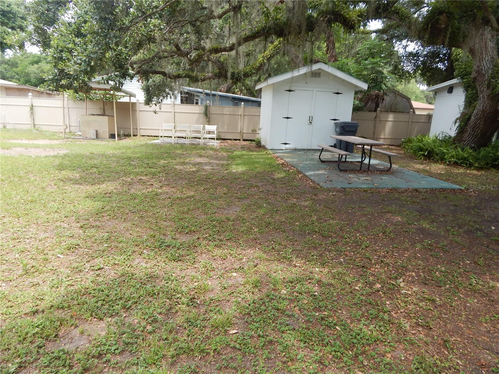 Kissimmee River and Chain of Lakes a minute away.  Quaint little Fishing Community residential lot for a manufactured home.  Quiet neighborhood for part time or full time living.  Lot has nice shed and concrete pad with shared well and septic.  Perfect location with easy access from the Turnpike between either of Florida's beautiful coasts. Only minutes to shopping, supplies, medical and restaurants.  Check it out today!