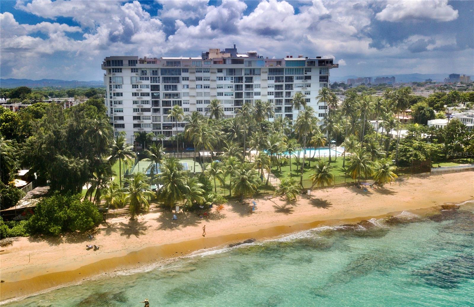 Wake up to the sound of waves and stunning ocean views in this modern, beachfront apartment. Just steps away from the sand, this completely remodeled 2 bedroom apartment is perfect for beach lovers and relaxation seekers. Floor to ceiling glass windows overlooking the beach — perfect for morning coffee or sunset wine. For the adventure seekers, Park Boulevard provides dedicated storage for your surfboards, paddle boards, kayaks, and more. Premium amenities include; swimming pool, fitness center, 24/7 security, tennis court, bbq's green areas. Full service generator and water cistern provide uninterrupted power and water service. Tucked in the beachfront community of Punta las Marias, Park Boulevard's beachy, laidback lifestyle has everything you need to relax and enjoy island living at its best. No short term allowed.