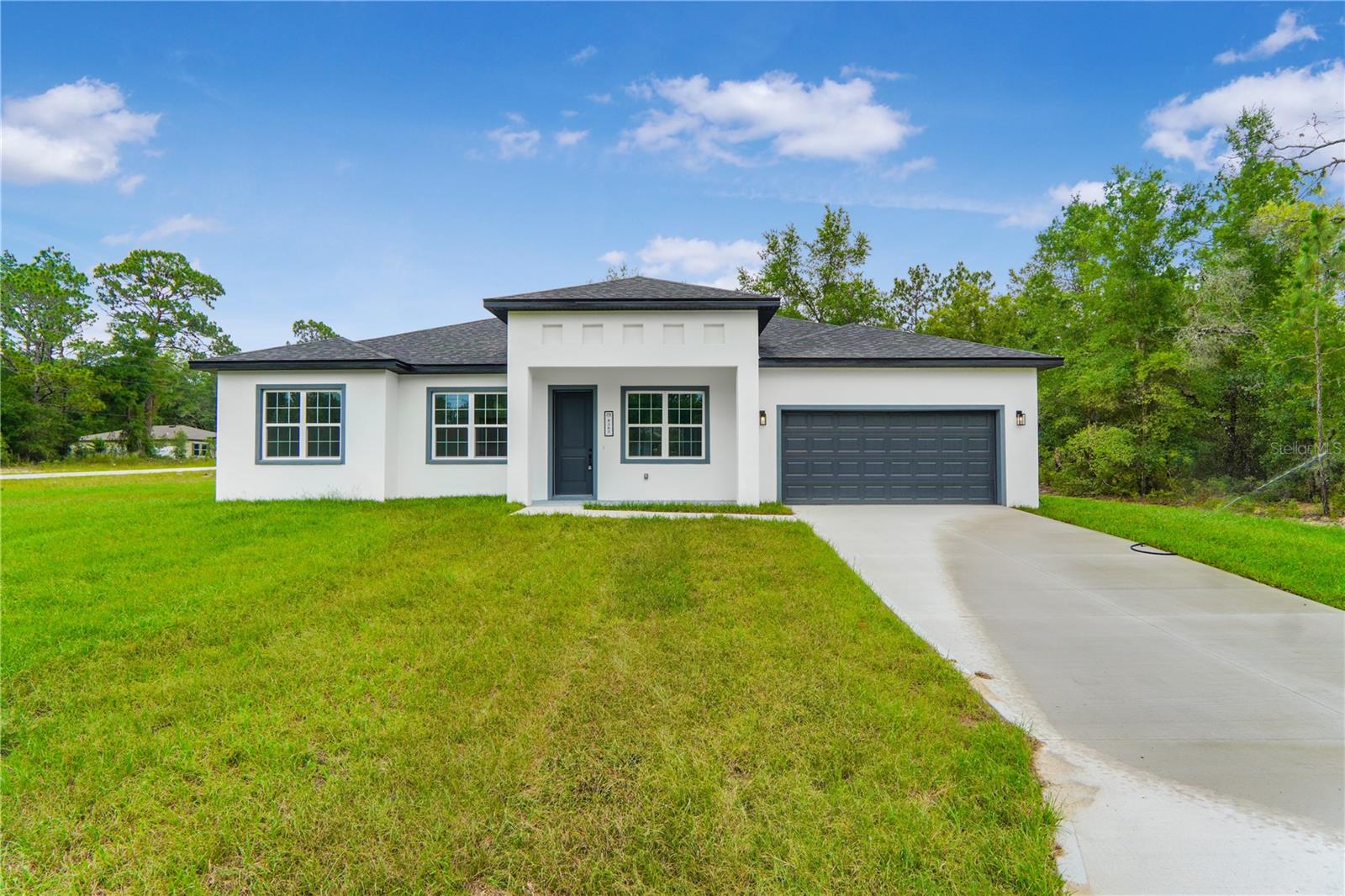 Brand-New 4-Bedroom Home on a Premium Oversized Corner Lot – 0.43 Acres

Welcome to this stunning newly built residence located at 8383 N Ibsen Dr, Dunnellon, FL 34433, situated on a premium oversized 0.43-acre corner lot in the growing community of Citrus Springs. Designed with comfort, style, and functionality in mind, this beautiful home features 4 spacious bedrooms and 3 full bathrooms, making it an ideal choice for families and buyers seeking modern living with timeless elegance.

The private primary suite serves as a relaxing retreat, complete with a generous walk-in closet and a beautifully designed en-suite bathroom. The additional bedrooms feature built-in closets, providing ample storage and comfortable accommodations for family members or guests. Two of the bathrooms include bathtubs, offering added convenience and flexibility for everyday living.

The open-concept floor plan creates a bright and inviting atmosphere, seamlessly connecting the living room, dining area, and kitchen. Perfect for entertaining or enjoying quality time at home, the kitchen showcases solid wood cabinetry, stone countertops, and included appliances, delivering both sophistication and practicality.

Additional highlights include a 2-car attached garage, thoughtfully designed living spaces, and the added benefits of an oversized corner lot, offering enhanced privacy, extra outdoor space, and exceptional curb appeal.

Conveniently located near the Citrus Springs Golf & Country Club, the Rainbow Springs State Park, shopping, dining, schools, and medical facilities, with easy access to both Dunnellon and Ocala.

Don't miss this opportunity to own a brand-new home on a 0.43-acre oversized corner lot in one of Central Florida's fastest-growing communities. Schedule your private showing today!
