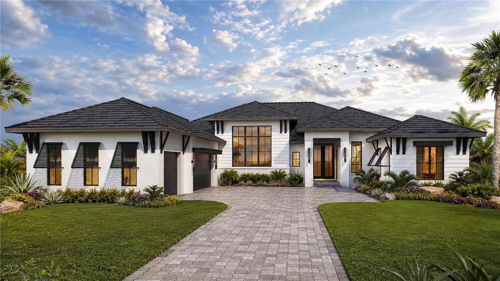 Discover a rare opportunity to build your custom dream home in the exclusive gated community of The Islands on the Manatee River. This spacious estate homesite of approximately 0.44 acres provides the perfect canvas for creating a luxury residence surrounded by the natural beauty of Florida’s Gulf Coast.

The Islands on the Manatee River is a private island community set along the scenic Manatee River, offering an exceptional lifestyle defined by boating, nature, and luxury custom homes. Spanning approximately 225 acres with only 178 homesites, the neighborhood is designed to provide privacy, space, and a true sense of retreat while remaining close to everything the Sarasota and Lakewood Ranch areas have to offer.

Residents enjoy access to the stunning River Lodge, a beautifully designed riverfront clubhouse that serves as the social heart of the community. Amenities include gathering spaces, a fitness center, catering kitchen, outdoor terraces, fire pit, bocce courts, and a community dock where residents can relax and enjoy picturesque river views.

The community offers estate-sized homesites and a bring-your-own-builder approach, allowing buyers the flexibility to design and build a custom home tailored to their vision. With no CDD fees and a limited number of homesites available, opportunities to build in this prestigious neighborhood are becoming increasingly rare.

Ideally located near the Fort Hamer Bridge, residents enjoy quick access to Lakewood Ranch, I-75, Sarasota, and the beautiful Gulf Coast beaches. Shopping, dining, golf, and world-class cultural attractions are all just a short drive away while the community itself maintains a peaceful, private island atmosphere.

This exceptional homesite offers the chance to create a one-of-a-kind custom residence in one of Parrish’s most distinctive and sought-after luxury communities.
The image depicted is an artistic rendering provided by John Cannon Homes and is intended for illustrative purposes only. The rendering represents a conceptual design of a home that may be constructed on this lot, subject to builder availability, buyer agreement, and community approval. The actual home, if built, may differ in design, size, materials, colors, landscaping, and finishes from what is shown.
This lot is being sold as vacant land. The inclusion of this rendering does not constitute a guarantee, warranty, or binding commitment by the seller, listing agent, or John Cannon Homes regarding the construction of any specific home or structure. All plans and specifications are subject to change without notice.
Prospective buyers are encouraged to contact John Cannon Homes directly for current floor plans, pricing, and availability. Additional builders may also be available for this lot, subject to community and HOA approval.