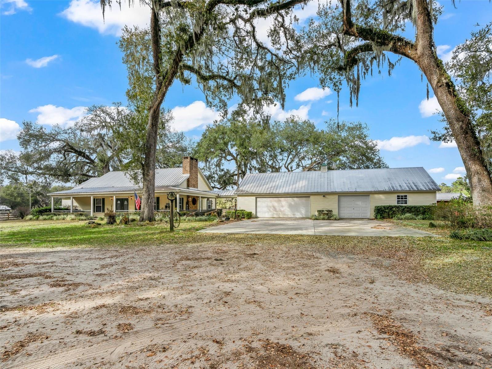A rare offering of space, privacy, and possibility, this distinguished 10-acre estate delivers the serenity of country living with the versatility todays buyers demand. Central Air is 2 years old.

Fully fenced and thoughtfully improved, the property features a spacious 2,040-square-foot residence designed for comfortable, expansive living. Generous interior proportions provide an inviting canvas for refined finishes, modern updates, or a personalized design vision.

Outdoors, the estate truly shines. Ten sprawling acres of usable land create a private sanctuary ideal for equestrian pursuits, agricultural ventures, recreational enjoyment, or simply embracing a quieter, more intentional lifestyle. A well-appointed barn and dedicated workshop add both function and flexibility, perfect for collectors, craftsmen, business owners, or those seeking secure storage for equipment and recreational vehicles.

Set in the tranquil countryside of Sumter County, yet conveniently positioned for access throughout Florida, this property offers the rare balance of seclusion without isolation.

Opportunities to acquire fully fenced acreage with substantial improvements are increasingly limited. This is more than a home, it is a private estate with enduring value and limitless potential.

Experience the scale, privacy, and possibility of this exceptional 10-acre offering.