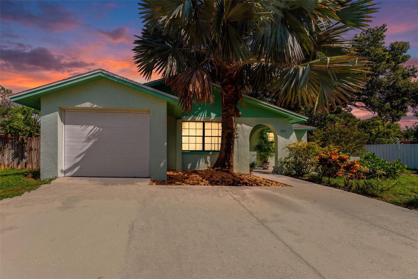 Virtually Staged. Welcome to this 3-bedroom, 2-bath home situated on an approximately one-third-acre lot in the Logan Gate Village community. This property features a screened-in pool installed in 2011, an oversized backyard, and a one-car garage, offering both indoor and outdoor living space.

Recent updates include a new A/C (2022), replacement air ducts (2023), exterior paint (2025), fresh interior paint (2026), and a roof replaced in 2011 with 30-year Tamko Heritage shingles.

The kitchen includes a dishwasher (approximately 3 years old), stove/oven (approximately 4 years old), and a washer and dryer (approximately 1.5 years old).

The annual HOA fee is $175, and there are no CDD fees.

Conveniently located near shopping, dining, parks, major roadways, and everyday amenities, this home offers easy access to everything the Tampa Bay area is known for.

Schedule your private showing today.