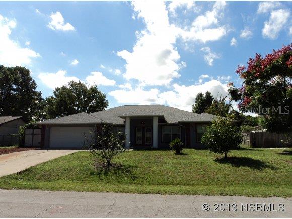 LARGE ONE OWNER CUSTOM BUILT WILLIE WOOD BLOCK HOME WITH IN-LAW QUARTERS AND 4 BEDROOMS/ 3 FULL BATHS, FORMAL LIVING AND DINING ROOMS AND SPACIOUS KITCHEN WITH EXTRA CABINETS AND COUNTER TOPS TO ACCOMMODATE EVEN THE GOURMET COOK. LARGE SPLIT BEDROOMS ALLOW FOR PRIVACY WITH TWO MASTER SUITES, ONE WITH LARGE GARDEN TUB WITH MANY JETS, WALK IN SHOWER SURROUNDED BY GLASS BLOCKS.STEEL REINFORCED TUBS IN OTHER BATHS.LARGE SCREENED PORCH TO ENJOY THE LUSH BACKYARD. THE HOME SITS HIGH AND DRY IN QUIET AREA OF FLORIDA SHORES YET MINUTES TO I95 AND US #1DOUBLE LOT HIGH & DRY ;Water: City